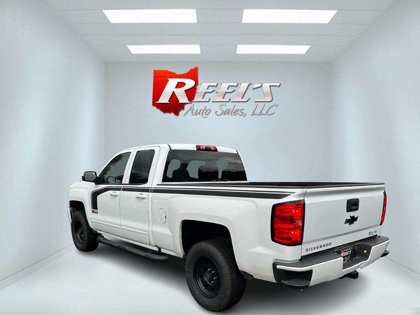 2016 White /Black Chevrolet Silverado 1500 LT Z71 Double Cab 4WD (1GCVKRECXGZ) with an 5.3L V8 OHV 16V engine, 6 Speed Auto transmission, located at 11115 Chardon Rd. , Chardon, OH, 44024, (440) 214-9705, 41.580246, -81.241943 - This 2016 Chevrolet Silverado LT Z71 Double Cab 4WD is a robust and versatile pickup truck, powered by a 5.3-liter Vortec V8 engine paired with a 6-speed automatic transmission, providing reliable performance and a towing capacity of 9,200 pounds. This model is well-equipped with modern amenities su - Photo#8