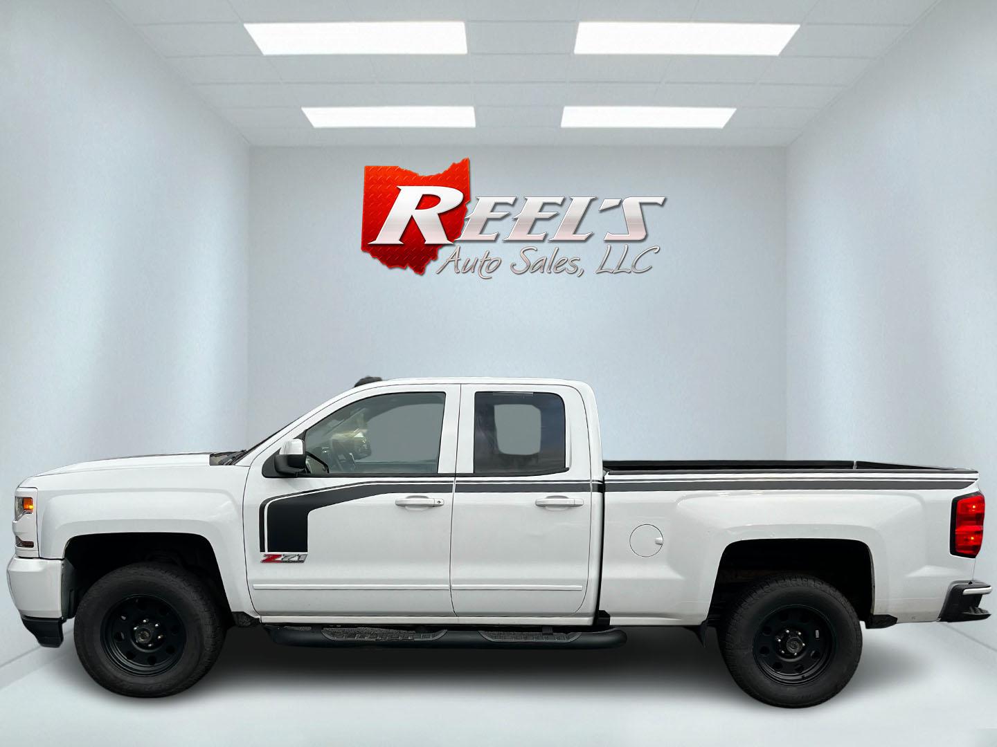 2016 White /Black Chevrolet Silverado 1500 LT Z71 Double Cab 4WD (1GCVKRECXGZ) with an 5.3L V8 OHV 16V engine, 6 Speed Auto transmission, located at 11115 Chardon Rd. , Chardon, OH, 44024, (440) 214-9705, 41.580246, -81.241943 - This 2016 Chevrolet Silverado LT Z71 Double Cab 4WD is a robust and versatile pickup truck, powered by a 5.3-liter Vortec V8 engine paired with a 6-speed automatic transmission, providing reliable performance and a towing capacity of 9,200 pounds. This model is well-equipped with modern amenities su - Photo#9