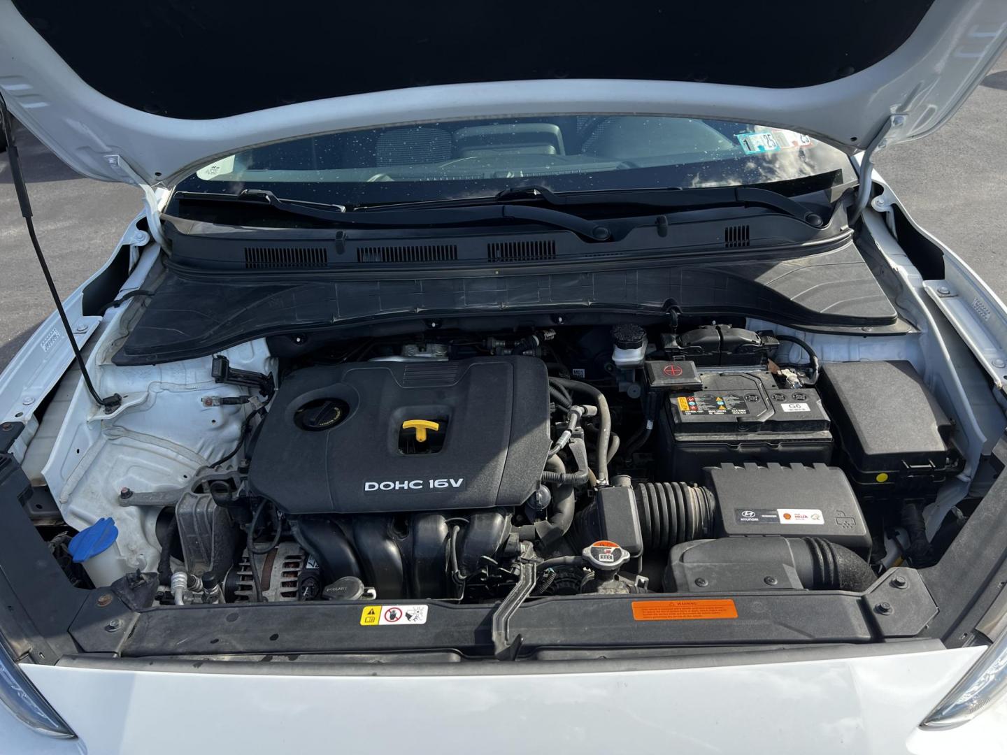 2019 White /Black Hyundai Kona SEL AWD (KM8K2CAA7KU) with an 2.0L I4 DOHC 16V engine, 6 Speed Automatic transmission, located at 547 E. Main St., Orwell, OH, 44076, (440) 437-5893, 41.535435, -80.847855 - This One Owner 2019 Hyundai Kona SEL AWD is a compact SUV that combines efficiency, safety, and technology features. Powered by a 2.0-liter I4 Atkinson engine coupled with a 6-speed automatic transmission, it delivers a commendable fuel efficiency of approximately 30 MPG on the highway. It is equipp - Photo#3