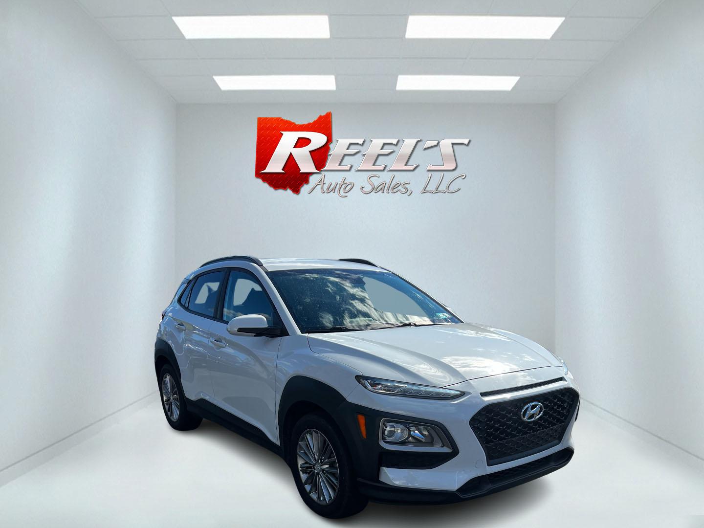 2019 White /Black Hyundai Kona SEL AWD (KM8K2CAA7KU) with an 2.0L I4 DOHC 16V engine, 6 Speed Automatic transmission, located at 547 E. Main St., Orwell, OH, 44076, (440) 437-5893, 41.535435, -80.847855 - This One Owner 2019 Hyundai Kona SEL AWD is a compact SUV that combines efficiency, safety, and technology features. Powered by a 2.0-liter I4 Atkinson engine coupled with a 6-speed automatic transmission, it delivers a commendable fuel efficiency of approximately 30 MPG on the highway. It is equipp - Photo#2