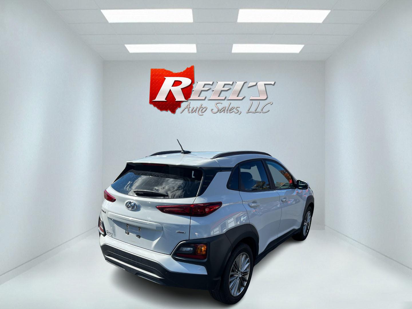 2019 White /Black Hyundai Kona SEL AWD (KM8K2CAA7KU) with an 2.0L I4 DOHC 16V engine, 6 Speed Automatic transmission, located at 547 E. Main St., Orwell, OH, 44076, (440) 437-5893, 41.535435, -80.847855 - This One Owner 2019 Hyundai Kona SEL AWD is a compact SUV that combines efficiency, safety, and technology features. Powered by a 2.0-liter I4 Atkinson engine coupled with a 6-speed automatic transmission, it delivers a commendable fuel efficiency of approximately 30 MPG on the highway. It is equipp - Photo#15