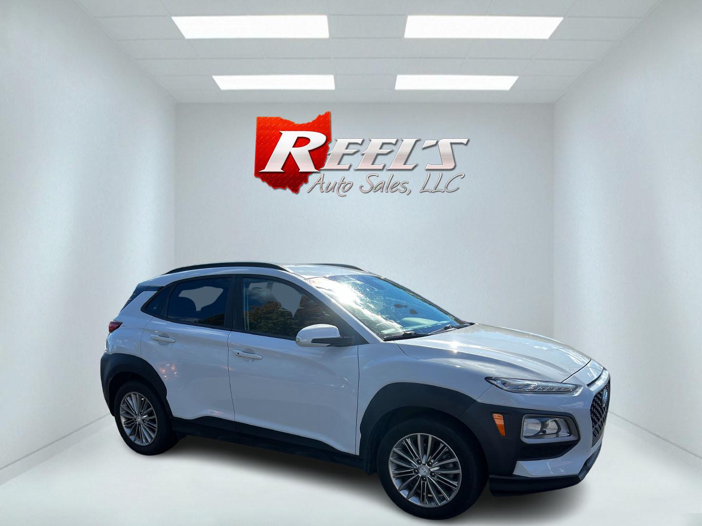 2019 White /Black Hyundai Kona SEL AWD (KM8K2CAA7KU) with an 2.0L I4 DOHC 16V engine, 6 Speed Automatic transmission, located at 547 E. Main St., Orwell, OH, 44076, (440) 437-5893, 41.535435, -80.847855 - This One Owner 2019 Hyundai Kona SEL AWD is a compact SUV that combines efficiency, safety, and technology features. Powered by a 2.0-liter I4 Atkinson engine coupled with a 6-speed automatic transmission, it delivers a commendable fuel efficiency of approximately 30 MPG on the highway. It is equipp - Photo#13
