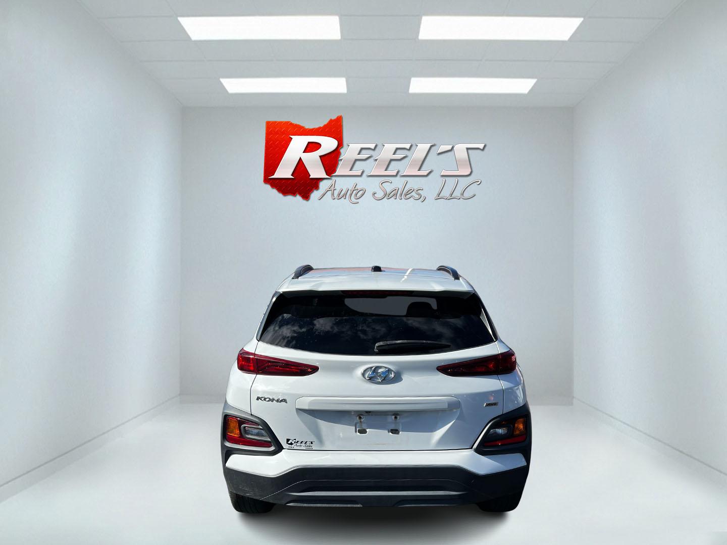 2019 White /Black Hyundai Kona SEL AWD (KM8K2CAA7KU) with an 2.0L I4 DOHC 16V engine, 6 Speed Automatic transmission, located at 547 E. Main St., Orwell, OH, 44076, (440) 437-5893, 41.535435, -80.847855 - This One Owner 2019 Hyundai Kona SEL AWD is a compact SUV that combines efficiency, safety, and technology features. Powered by a 2.0-liter I4 Atkinson engine coupled with a 6-speed automatic transmission, it delivers a commendable fuel efficiency of approximately 30 MPG on the highway. It is equipp - Photo#16