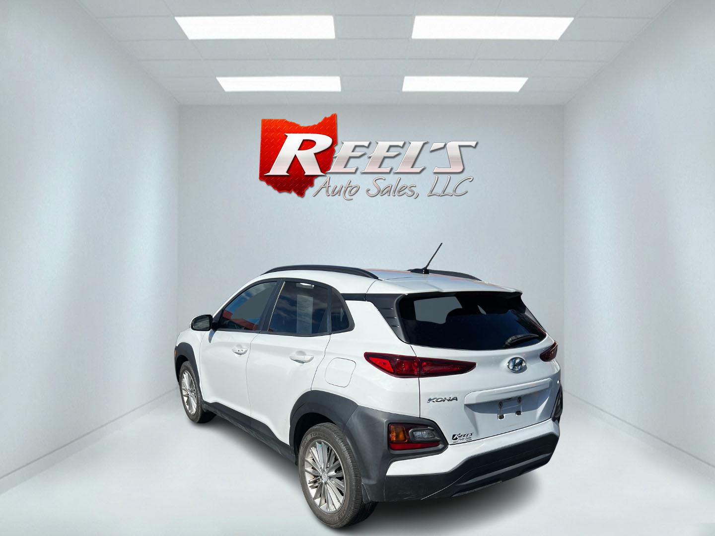 2019 White /Black Hyundai Kona SEL AWD (KM8K2CAA7KU) with an 2.0L I4 DOHC 16V engine, 6 Speed Automatic transmission, located at 547 E. Main St., Orwell, OH, 44076, (440) 437-5893, 41.535435, -80.847855 - This One Owner 2019 Hyundai Kona SEL AWD is a compact SUV that combines efficiency, safety, and technology features. Powered by a 2.0-liter I4 Atkinson engine coupled with a 6-speed automatic transmission, it delivers a commendable fuel efficiency of approximately 30 MPG on the highway. It is equipp - Photo#17