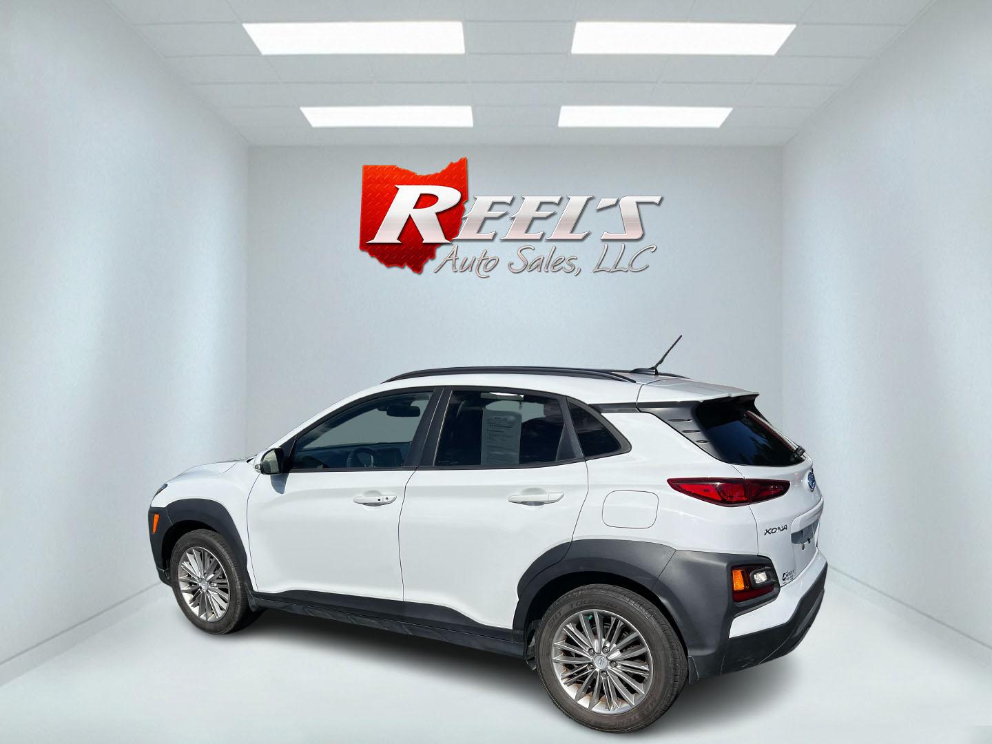 2019 White /Black Hyundai Kona SEL AWD (KM8K2CAA7KU) with an 2.0L I4 DOHC 16V engine, 6 Speed Automatic transmission, located at 547 E. Main St., Orwell, OH, 44076, (440) 437-5893, 41.535435, -80.847855 - This One Owner 2019 Hyundai Kona SEL AWD is a compact SUV that combines efficiency, safety, and technology features. Powered by a 2.0-liter I4 Atkinson engine coupled with a 6-speed automatic transmission, it delivers a commendable fuel efficiency of approximately 30 MPG on the highway. It is equipp - Photo#18