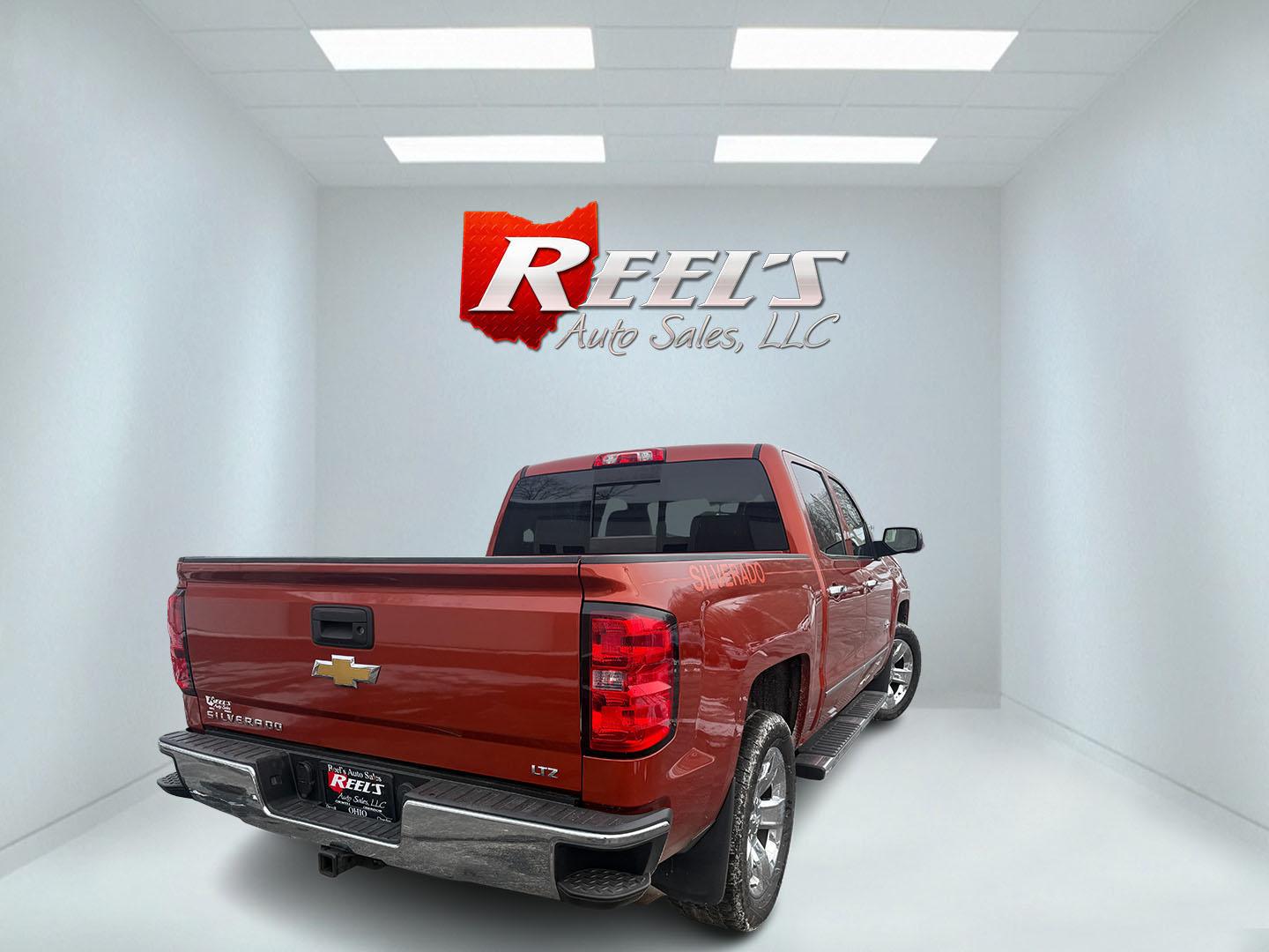 2015 Orange /Black Chevrolet Silverado 1500 LTZ Crew Cab 4WD (3GCUKSEC8FG) with an 5.3L V8 OHV 16V engine, Automatic transmission, located at 11115 Chardon Rd. , Chardon, OH, 44024, (440) 214-9705, 41.580246, -81.241943 - 2015 Chevrolet Silverado 1500 LTZ Crew Cab 4WD – Premium Power, Reliability, and Comfort Experience the perfect combination of strength, luxury, and dependability with this 2015 Chevrolet Silverado 1500 LTZ Crew Cab 4WD. Under the hood, the proven 5.3L EcoTec3 V8 engine paired with a 6-speed au - Photo#26