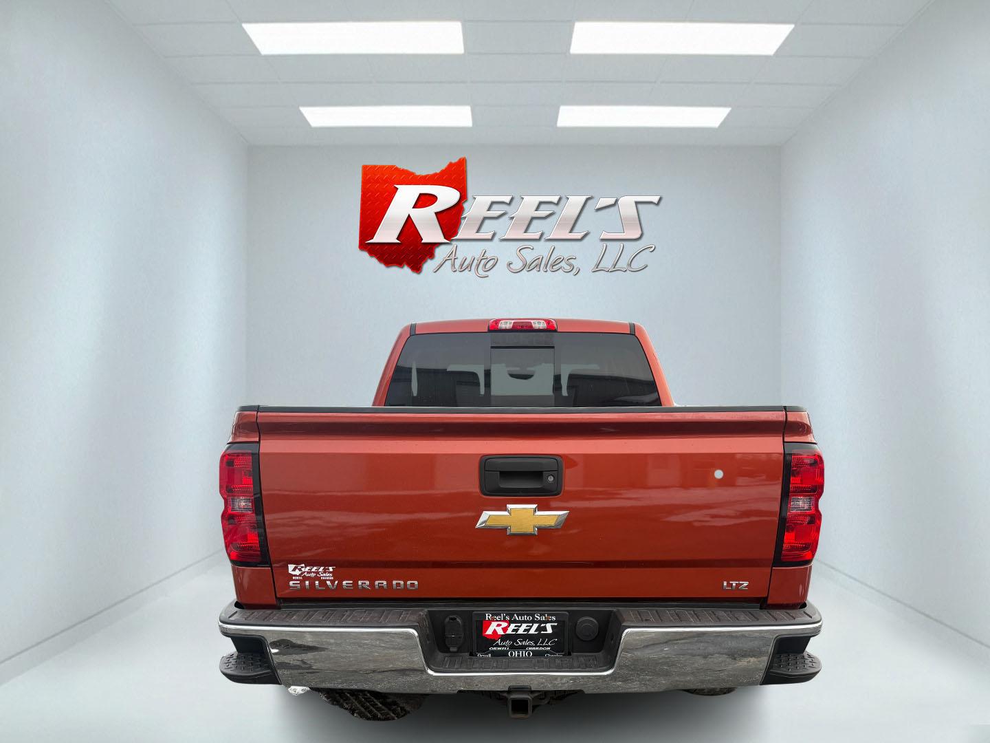 2015 Orange /Black Chevrolet Silverado 1500 LTZ Crew Cab 4WD (3GCUKSEC8FG) with an 5.3L V8 OHV 16V engine, Automatic transmission, located at 11115 Chardon Rd. , Chardon, OH, 44024, (440) 214-9705, 41.580246, -81.241943 - 2015 Chevrolet Silverado 1500 LTZ Crew Cab 4WD – Premium Power, Reliability, and Comfort Experience the perfect combination of strength, luxury, and dependability with this 2015 Chevrolet Silverado 1500 LTZ Crew Cab 4WD. Under the hood, the proven 5.3L EcoTec3 V8 engine paired with a 6-speed au - Photo#27