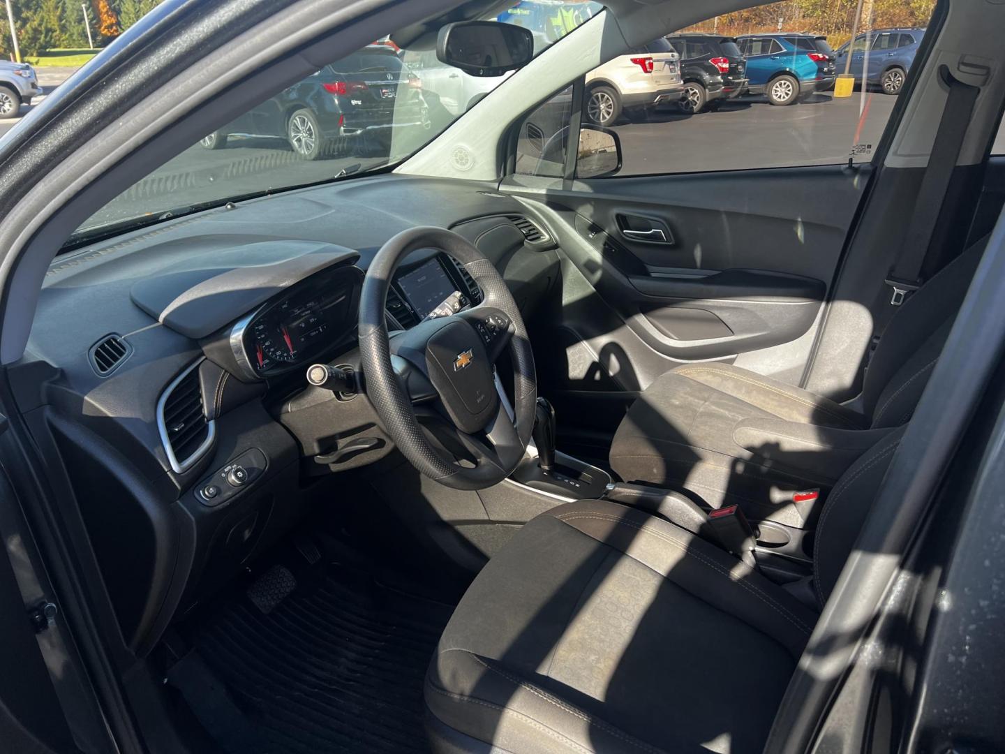 2020 Gray /Black Chevrolet Trax LS FWD (3GNCJKSB9LL) with an 1.4L I4 DOHC 16V TURBO engine, 6A transmission, located at 547 E. Main St., Orwell, OH, 44076, (440) 437-5893, 41.535435, -80.847855 - This 2020 Chevrolet Trax LS FWD is a compact SUV featuring a 1.4L I4 turbocharged EcoTec engine paired with a 6-speed automatic transmission, delivering an efficient performance with an estimated 31 MPG on the highway. It includes modern technological amenities such as a 7.0" touchscreen with both A - Photo#4