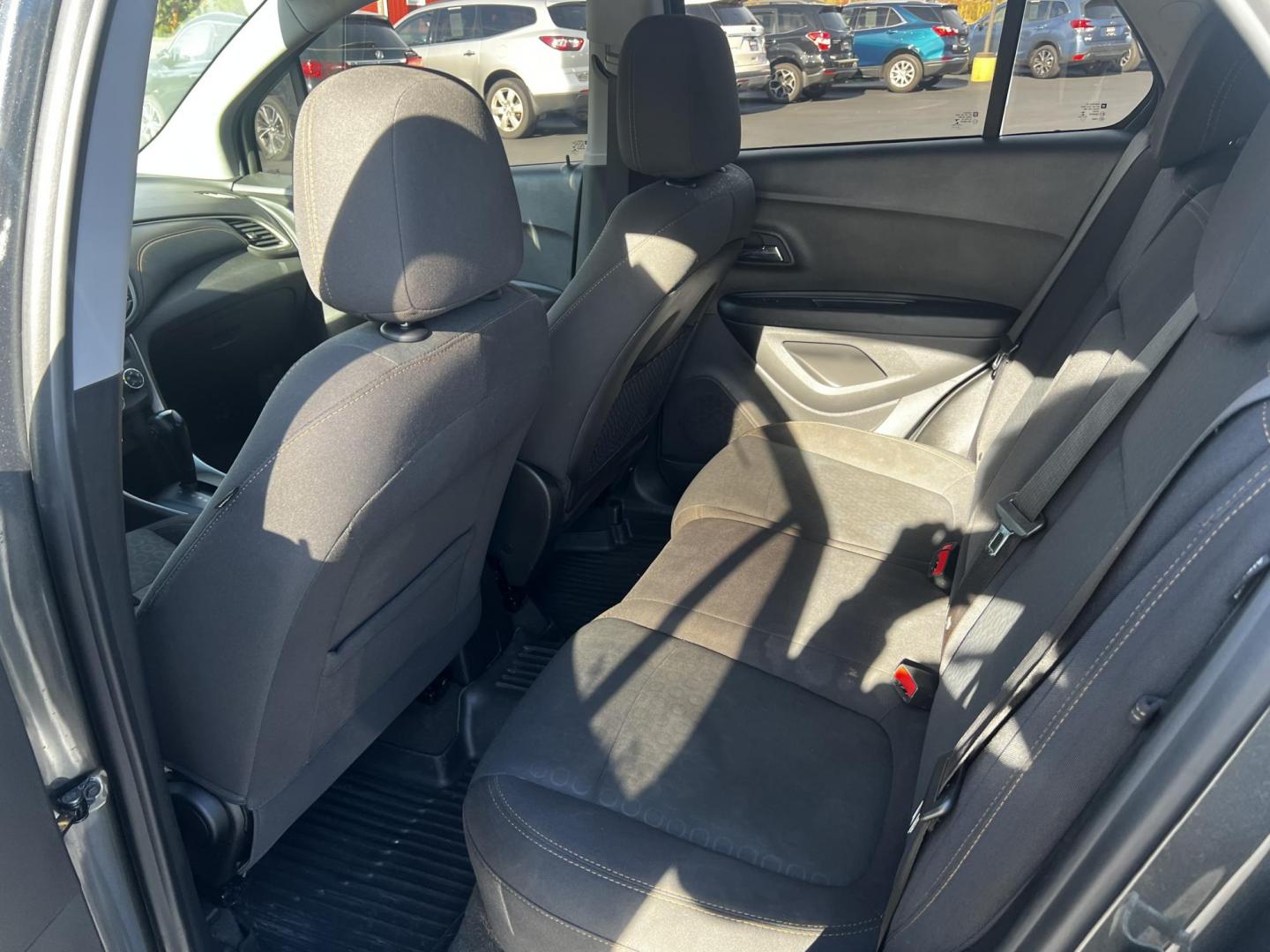 2020 Gray /Black Chevrolet Trax LS FWD (3GNCJKSB9LL) with an 1.4L I4 DOHC 16V TURBO engine, 6A transmission, located at 547 E. Main St., Orwell, OH, 44076, (440) 437-5893, 41.535435, -80.847855 - This 2020 Chevrolet Trax LS FWD is a compact SUV featuring a 1.4L I4 turbocharged EcoTec engine paired with a 6-speed automatic transmission, delivering an efficient performance with an estimated 31 MPG on the highway. It includes modern technological amenities such as a 7.0" touchscreen with both A - Photo#30