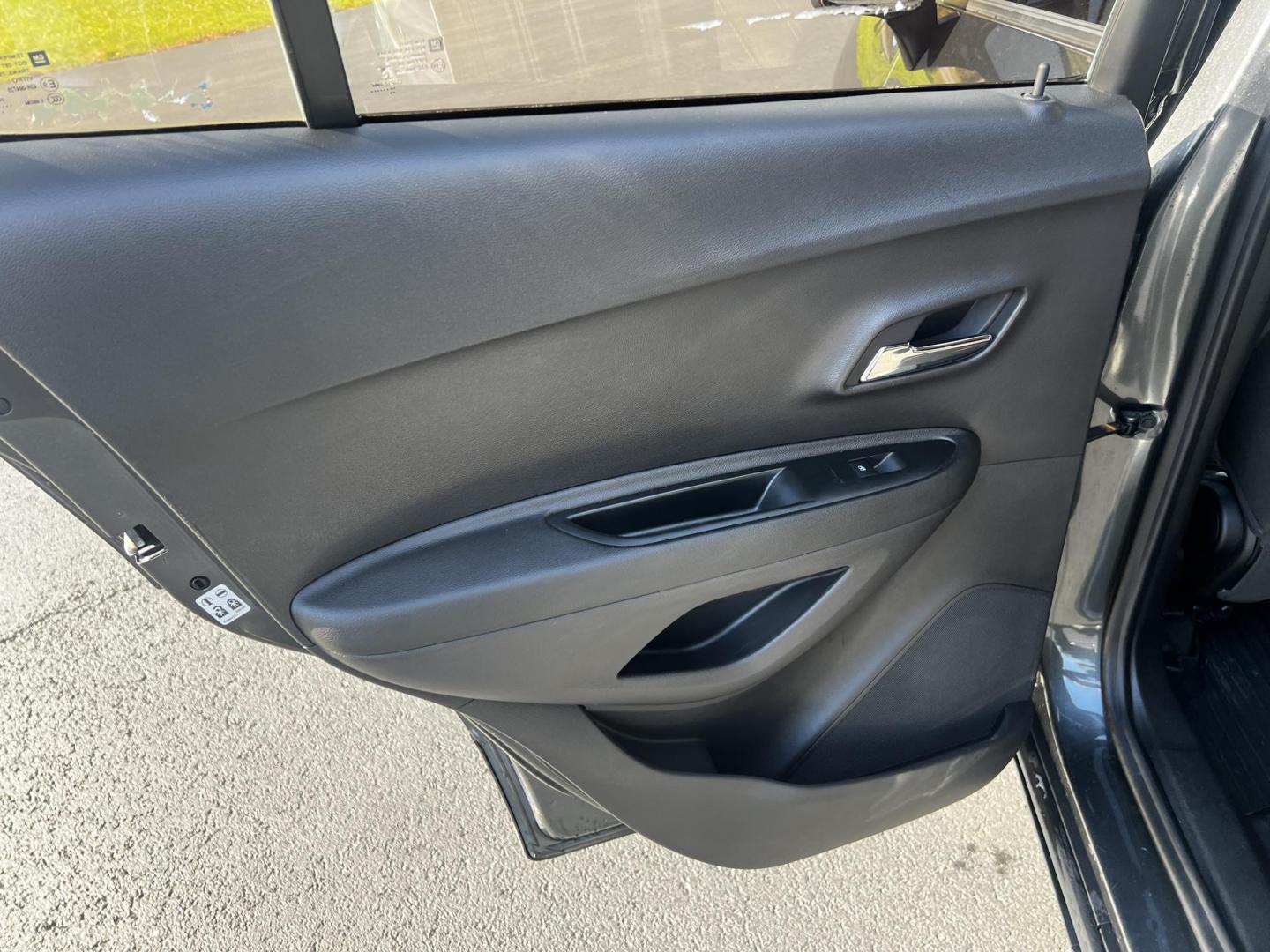 2020 Gray /Black Chevrolet Trax LS FWD (3GNCJKSB9LL) with an 1.4L I4 DOHC 16V TURBO engine, 6A transmission, located at 547 E. Main St., Orwell, OH, 44076, (440) 437-5893, 41.535435, -80.847855 - This 2020 Chevrolet Trax LS FWD is a compact SUV featuring a 1.4L I4 turbocharged EcoTec engine paired with a 6-speed automatic transmission, delivering an efficient performance with an estimated 31 MPG on the highway. It includes modern technological amenities such as a 7.0" touchscreen with both A - Photo#31