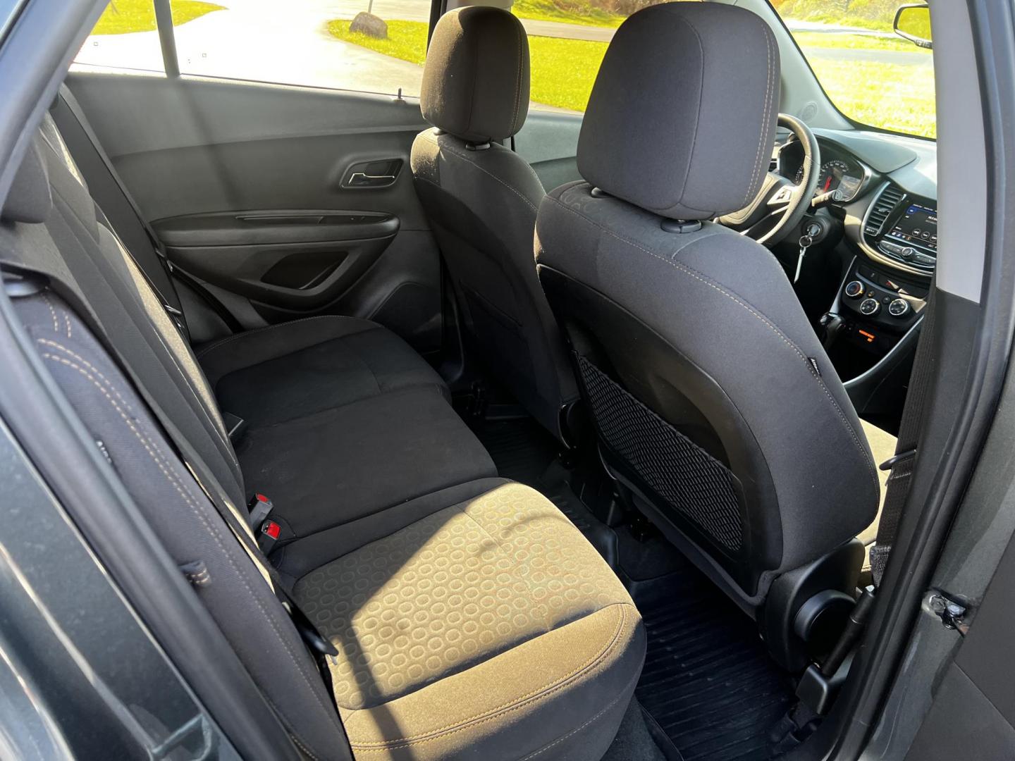 2020 Gray /Black Chevrolet Trax LS FWD (3GNCJKSB9LL) with an 1.4L I4 DOHC 16V TURBO engine, 6A transmission, located at 547 E. Main St., Orwell, OH, 44076, (440) 437-5893, 41.535435, -80.847855 - This 2020 Chevrolet Trax LS FWD is a compact SUV featuring a 1.4L I4 turbocharged EcoTec engine paired with a 6-speed automatic transmission, delivering an efficient performance with an estimated 31 MPG on the highway. It includes modern technological amenities such as a 7.0" touchscreen with both A - Photo#33