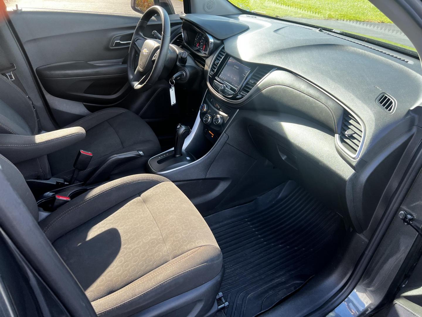 2020 Gray /Black Chevrolet Trax LS FWD (3GNCJKSB9LL) with an 1.4L I4 DOHC 16V TURBO engine, 6A transmission, located at 547 E. Main St., Orwell, OH, 44076, (440) 437-5893, 41.535435, -80.847855 - This 2020 Chevrolet Trax LS FWD is a compact SUV featuring a 1.4L I4 turbocharged EcoTec engine paired with a 6-speed automatic transmission, delivering an efficient performance with an estimated 31 MPG on the highway. It includes modern technological amenities such as a 7.0" touchscreen with both A - Photo#35