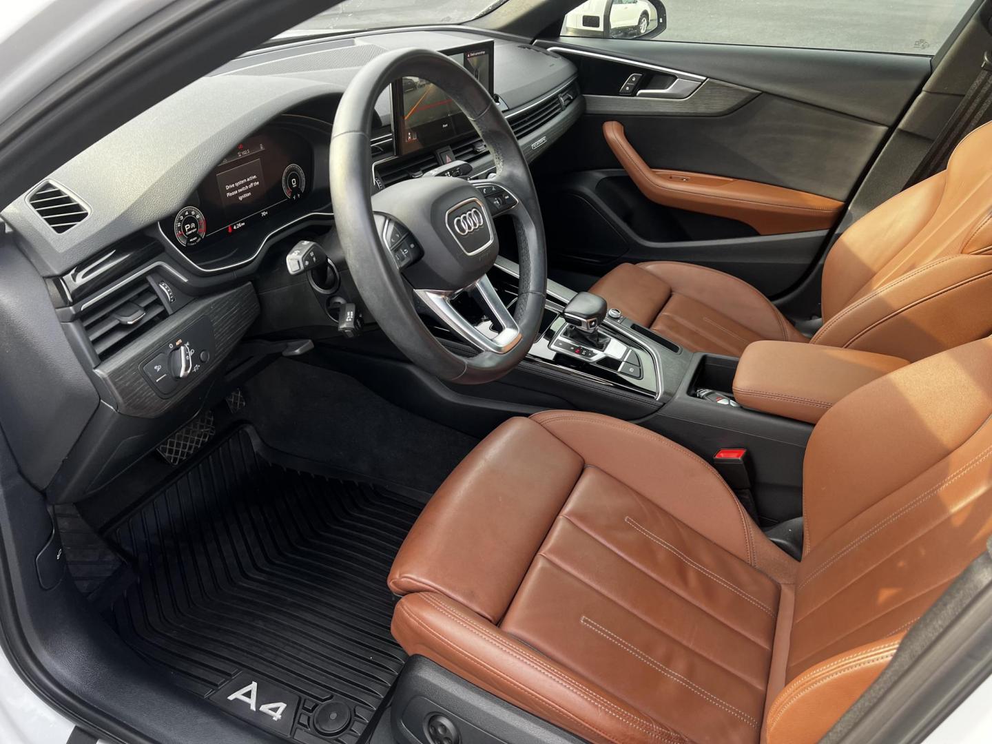 2021 White /Brown Audi A4 Premium Plus quattro (WAUEAAF4XMA) with an 2.0L I4 DOHC 16V TURBO engine, 7A transmission, located at 547 E. Main St., Orwell, OH, 44076, (440) 437-5893, 41.535435, -80.847855 - This One Owner 2021 Audi A4 Premium Plus S Line is equipped with a robust 2.0 I4 turbocharged engine and a 7-speed dual-clutch automatic transmission, allowing it to accelerate from 0 to 60 mph in 5.2 seconds, while achieving an impressive 31 MPG on the highway. This model is designed with advanced - Photo#17