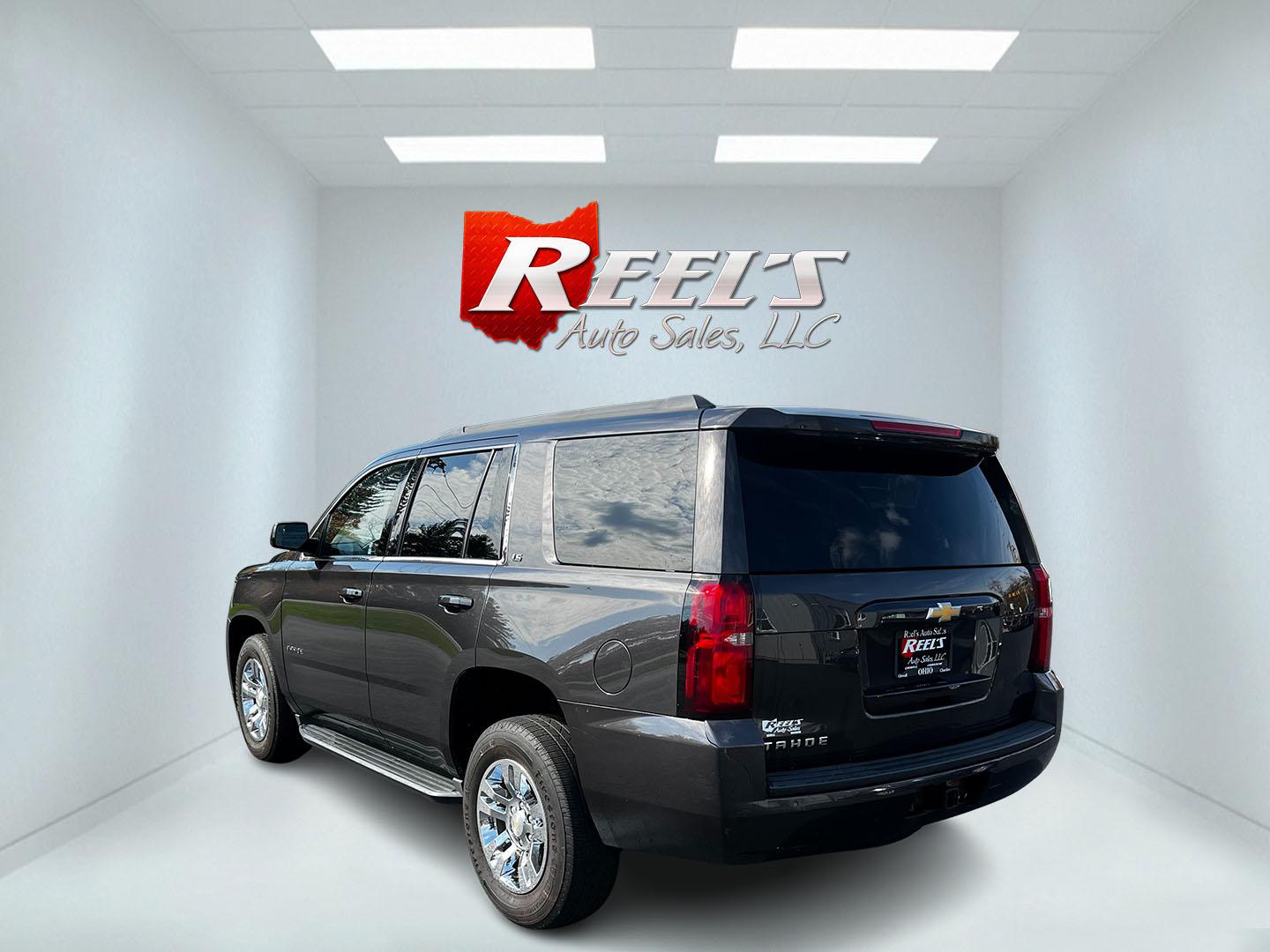 2016 Gray /Black Chevrolet Tahoe LS 4WD (1GNSKAKC3GR) with an 5.3L V8 OHV 16V engine, 6A transmission, located at 547 E. Main St., Orwell, OH, 44076, (440) 437-5893, 41.535435, -80.847855 - This One Owner 2016 Chevrolet Tahoe LS 4WD is powered by a 5.3 Vortec V8 engine paired with a 6-speed automatic transmission, providing robust performance for various driving conditions. It offers features like tri-zone automatic climate control and power front seats to enhance passenger comfort. Fo - Photo#7