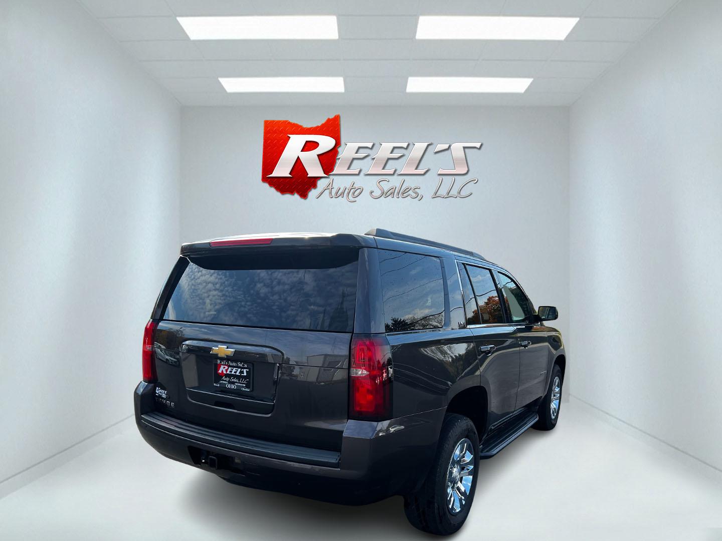2016 Gray /Black Chevrolet Tahoe LS 4WD (1GNSKAKC3GR) with an 5.3L V8 OHV 16V engine, 6A transmission, located at 547 E. Main St., Orwell, OH, 44076, (440) 437-5893, 41.535435, -80.847855 - This One Owner 2016 Chevrolet Tahoe LS 4WD is powered by a 5.3 Vortec V8 engine paired with a 6-speed automatic transmission, providing robust performance for various driving conditions. It offers features like tri-zone automatic climate control and power front seats to enhance passenger comfort. Fo - Photo#5