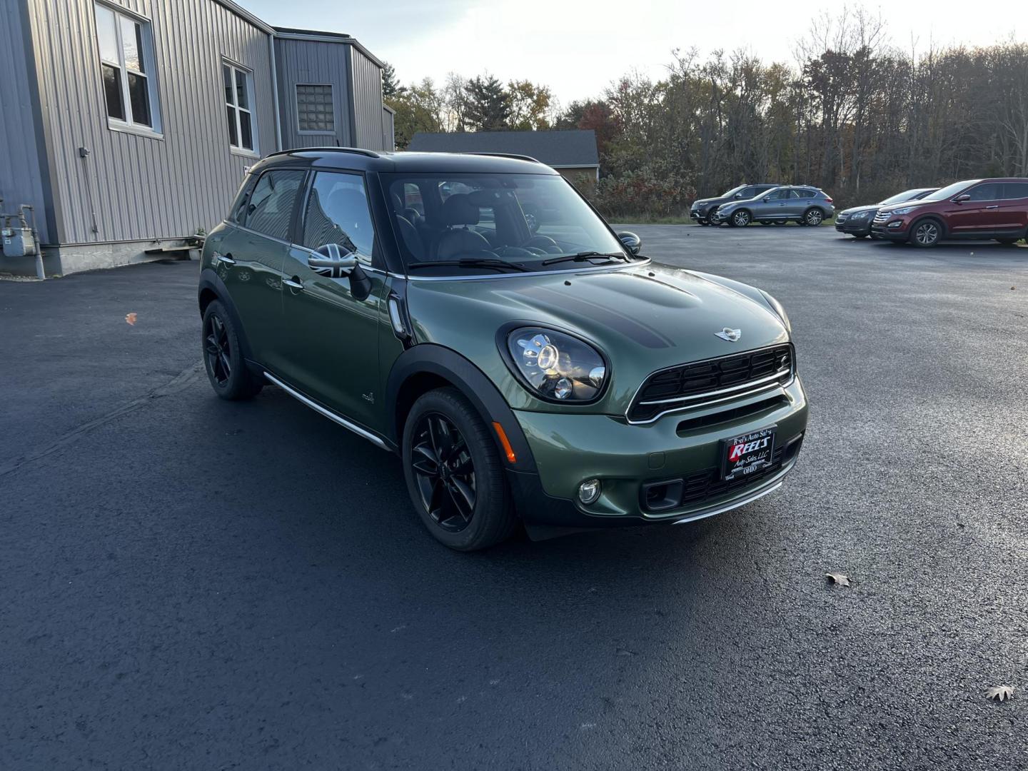 2016 Green /Black Mini Countryman S ALL4 (WMWZC5C5XGW) with an 1.6L I4 DOHC 16V TURBO engine, 8-Speed Automatic transmission, located at 11115 Chardon Rd. , Chardon, OH, 44024, (440) 214-9705, 41.580246, -81.241943 - This One Owner 2016 Mini Cooper S Countryman All4 is a compact SUV offering a blend of performance and premium features. It features a 1.6-liter turbocharged inline-4 engine producing 181 horsepower, paired with an 8-speed automatic transmission. Notable for its sporty drive, it can accelerate from - Photo#1