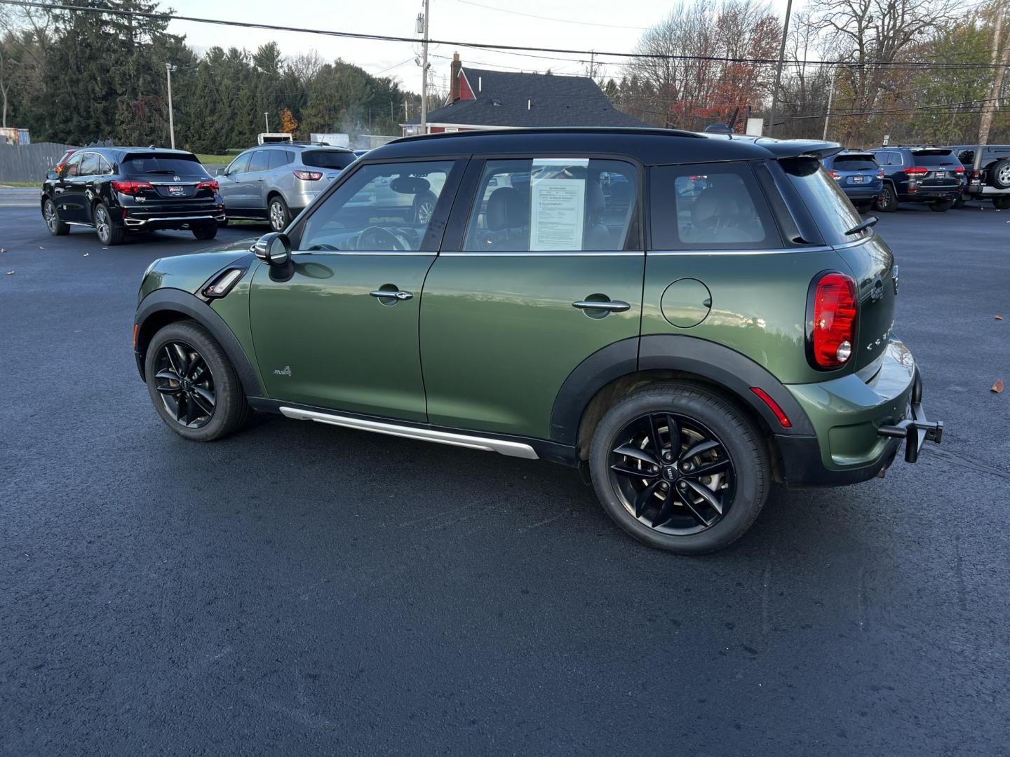 2016 Green /Black Mini Countryman S ALL4 (WMWZC5C5XGW) with an 1.6L I4 DOHC 16V TURBO engine, 8-Speed Automatic transmission, located at 11115 Chardon Rd. , Chardon, OH, 44024, (440) 214-9705, 41.580246, -81.241943 - This One Owner 2016 Mini Cooper S Countryman All4 is a compact SUV offering a blend of performance and premium features. It features a 1.6-liter turbocharged inline-4 engine producing 181 horsepower, paired with an 8-speed automatic transmission. Notable for its sporty drive, it can accelerate from - Photo#11