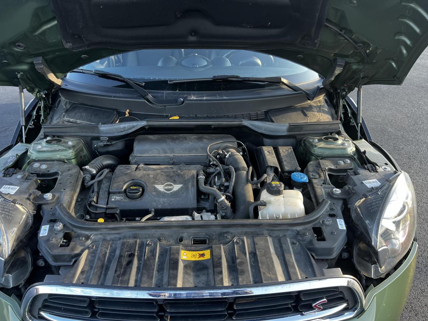 2016 Green /Black Mini Countryman S ALL4 (WMWZC5C5XGW) with an 1.6L I4 DOHC 16V TURBO engine, 8-Speed Automatic transmission, located at 11115 Chardon Rd. , Chardon, OH, 44024, (440) 214-9705, 41.580246, -81.241943 - This One Owner 2016 Mini Cooper S Countryman All4 is a compact SUV offering a blend of performance and premium features. It features a 1.6-liter turbocharged inline-4 engine producing 181 horsepower, paired with an 8-speed automatic transmission. Notable for its sporty drive, it can accelerate from - Photo#12