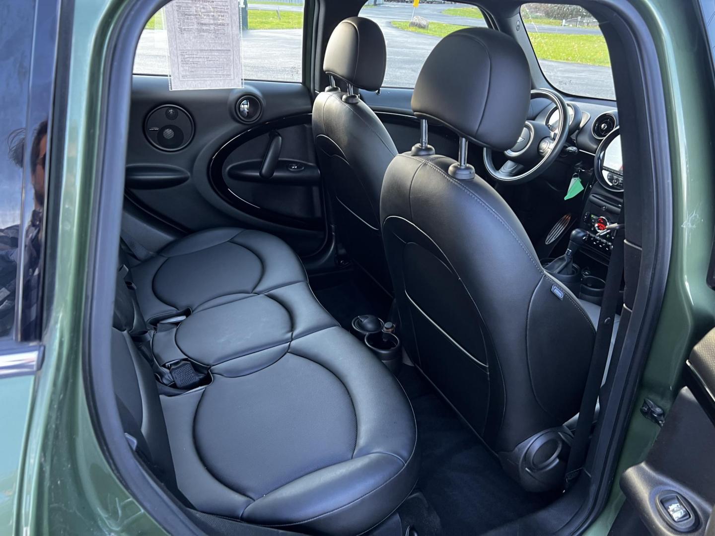 2016 Green /Black Mini Countryman S ALL4 (WMWZC5C5XGW) with an 1.6L I4 DOHC 16V TURBO engine, 8-Speed Automatic transmission, located at 11115 Chardon Rd. , Chardon, OH, 44024, (440) 214-9705, 41.580246, -81.241943 - This One Owner 2016 Mini Cooper S Countryman All4 is a compact SUV offering a blend of performance and premium features. It features a 1.6-liter turbocharged inline-4 engine producing 181 horsepower, paired with an 8-speed automatic transmission. Notable for its sporty drive, it can accelerate from - Photo#32