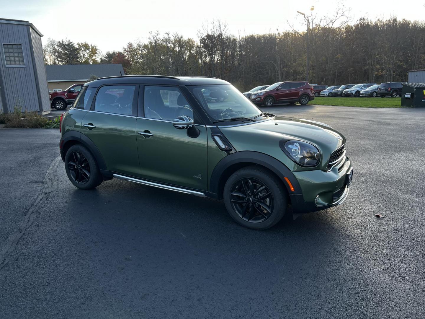 2016 Green /Black Mini Countryman S ALL4 (WMWZC5C5XGW) with an 1.6L I4 DOHC 16V TURBO engine, 8-Speed Automatic transmission, located at 11115 Chardon Rd. , Chardon, OH, 44024, (440) 214-9705, 41.580246, -81.241943 - This One Owner 2016 Mini Cooper S Countryman All4 is a compact SUV offering a blend of performance and premium features. It features a 1.6-liter turbocharged inline-4 engine producing 181 horsepower, paired with an 8-speed automatic transmission. Notable for its sporty drive, it can accelerate from - Photo#4