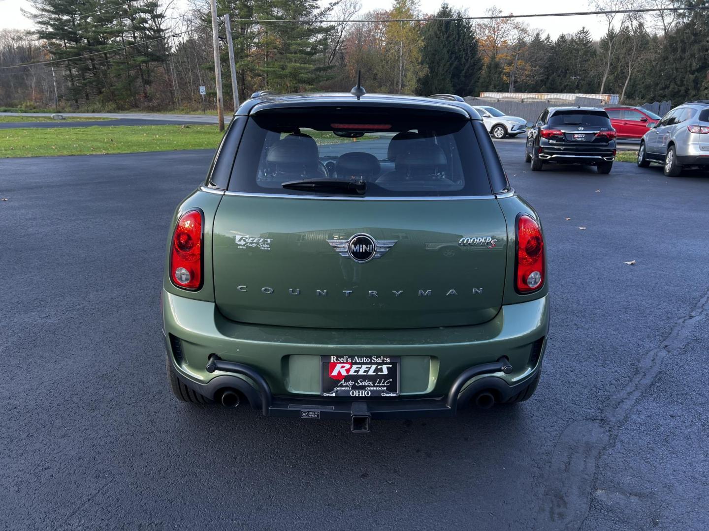 2016 Green /Black Mini Countryman S ALL4 (WMWZC5C5XGW) with an 1.6L I4 DOHC 16V TURBO engine, 8-Speed Automatic transmission, located at 11115 Chardon Rd. , Chardon, OH, 44024, (440) 214-9705, 41.580246, -81.241943 - This One Owner 2016 Mini Cooper S Countryman All4 is a compact SUV offering a blend of performance and premium features. It features a 1.6-liter turbocharged inline-4 engine producing 181 horsepower, paired with an 8-speed automatic transmission. Notable for its sporty drive, it can accelerate from - Photo#6