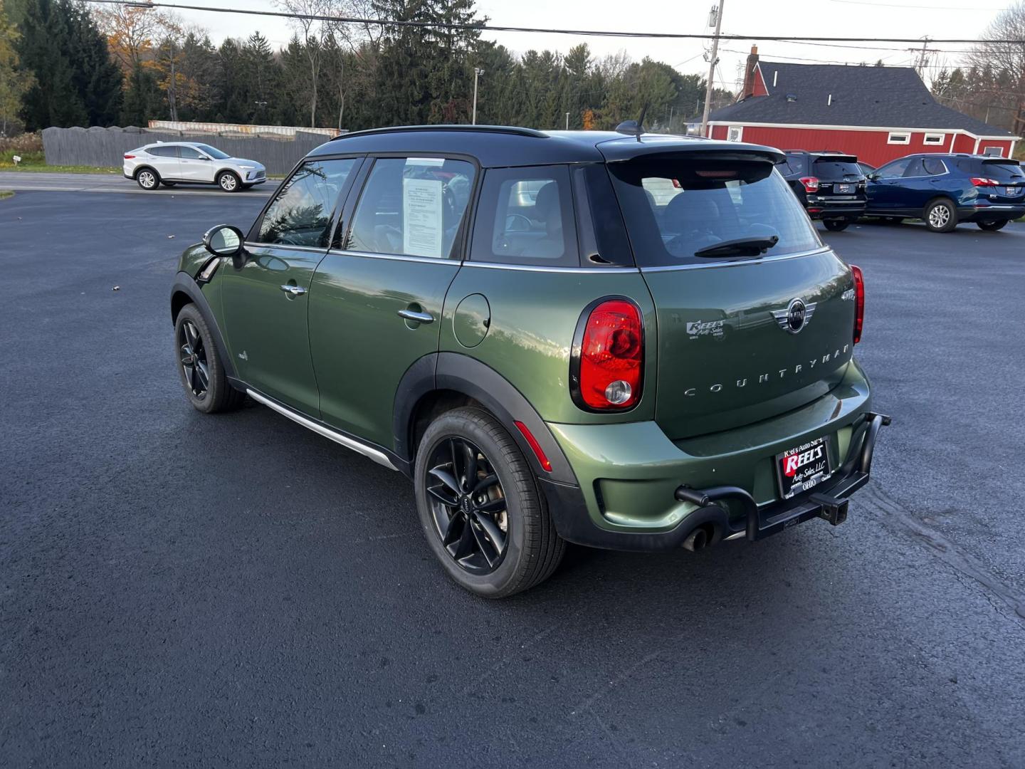 2016 Green /Black Mini Countryman S ALL4 (WMWZC5C5XGW) with an 1.6L I4 DOHC 16V TURBO engine, 8-Speed Automatic transmission, located at 11115 Chardon Rd. , Chardon, OH, 44024, (440) 214-9705, 41.580246, -81.241943 - This One Owner 2016 Mini Cooper S Countryman All4 is a compact SUV offering a blend of performance and premium features. It features a 1.6-liter turbocharged inline-4 engine producing 181 horsepower, paired with an 8-speed automatic transmission. Notable for its sporty drive, it can accelerate from - Photo#9