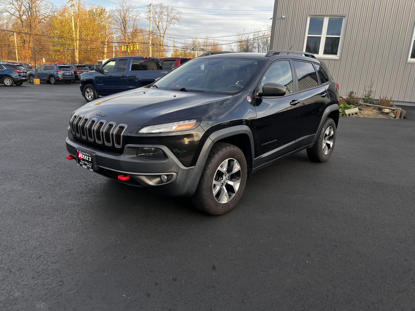 2015 Black /Black Jeep Cherokee Trailhawk 4WD (1C4PJMBS8FW) with an 3.2L V6 DOHC 24V engine, 9-Speed Automatic transmission, located at 11115 Chardon Rd. , Chardon, OH, 44024, (440) 214-9705, 41.580246, -81.241943 - Photo#0