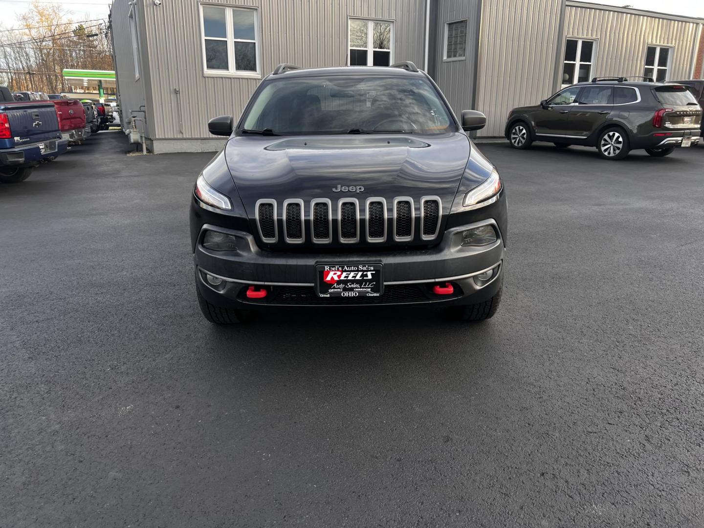 2015 Black /Black Jeep Cherokee Trailhawk 4WD (1C4PJMBS8FW) with an 3.2L V6 DOHC 24V engine, 9-Speed Automatic transmission, located at 11115 Chardon Rd. , Chardon, OH, 44024, (440) 214-9705, 41.580246, -81.241943 - Photo#1