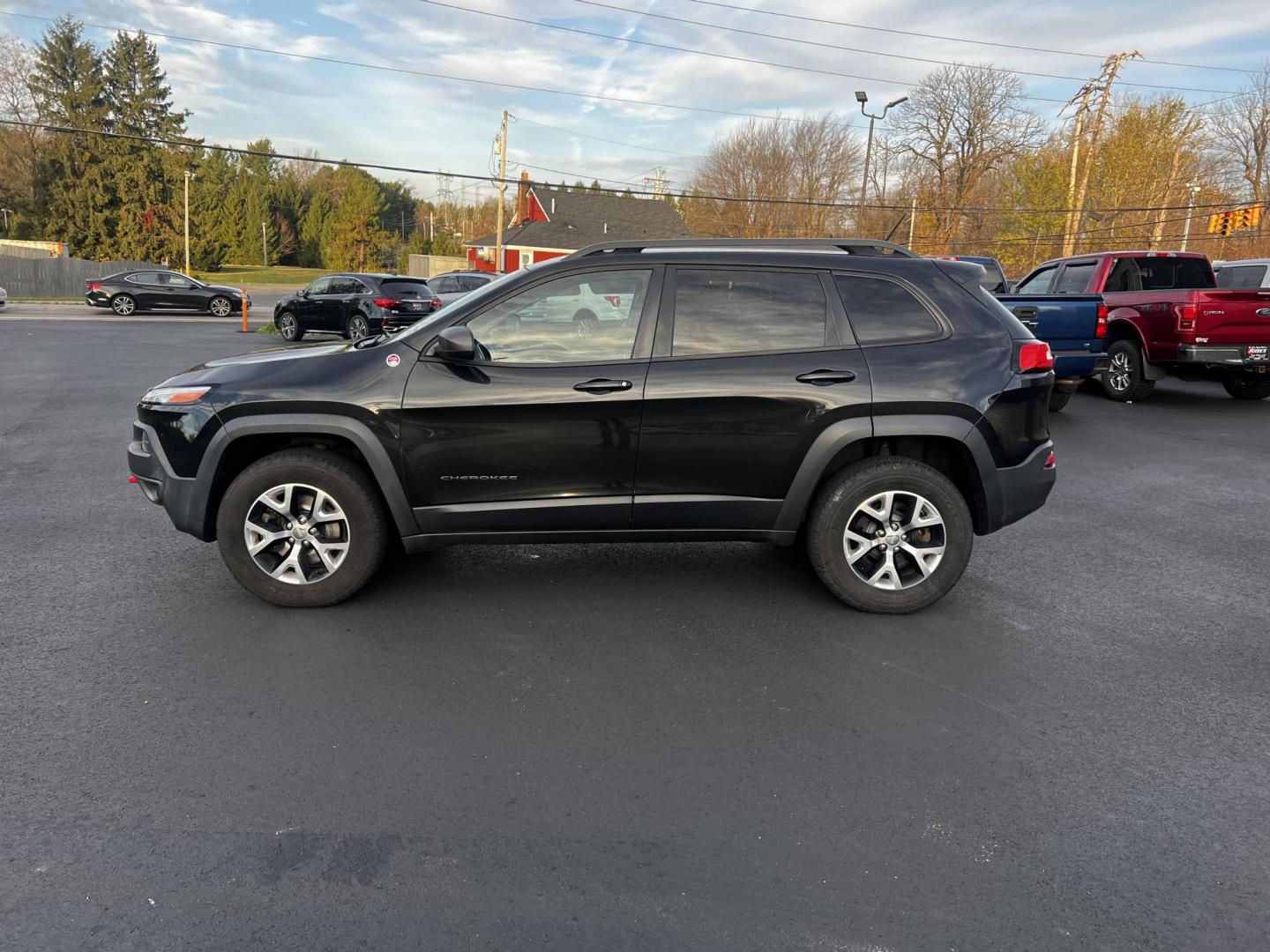 2015 Black /Black Jeep Cherokee Trailhawk 4WD (1C4PJMBS8FW) with an 3.2L V6 DOHC 24V engine, 9-Speed Automatic transmission, located at 11115 Chardon Rd. , Chardon, OH, 44024, (440) 214-9705, 41.580246, -81.241943 - Photo#13