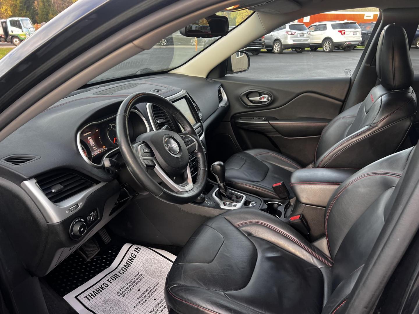 2015 Black /Black Jeep Cherokee Trailhawk 4WD (1C4PJMBS8FW) with an 3.2L V6 DOHC 24V engine, 9-Speed Automatic transmission, located at 11115 Chardon Rd. , Chardon, OH, 44024, (440) 214-9705, 41.580246, -81.241943 - Photo#15