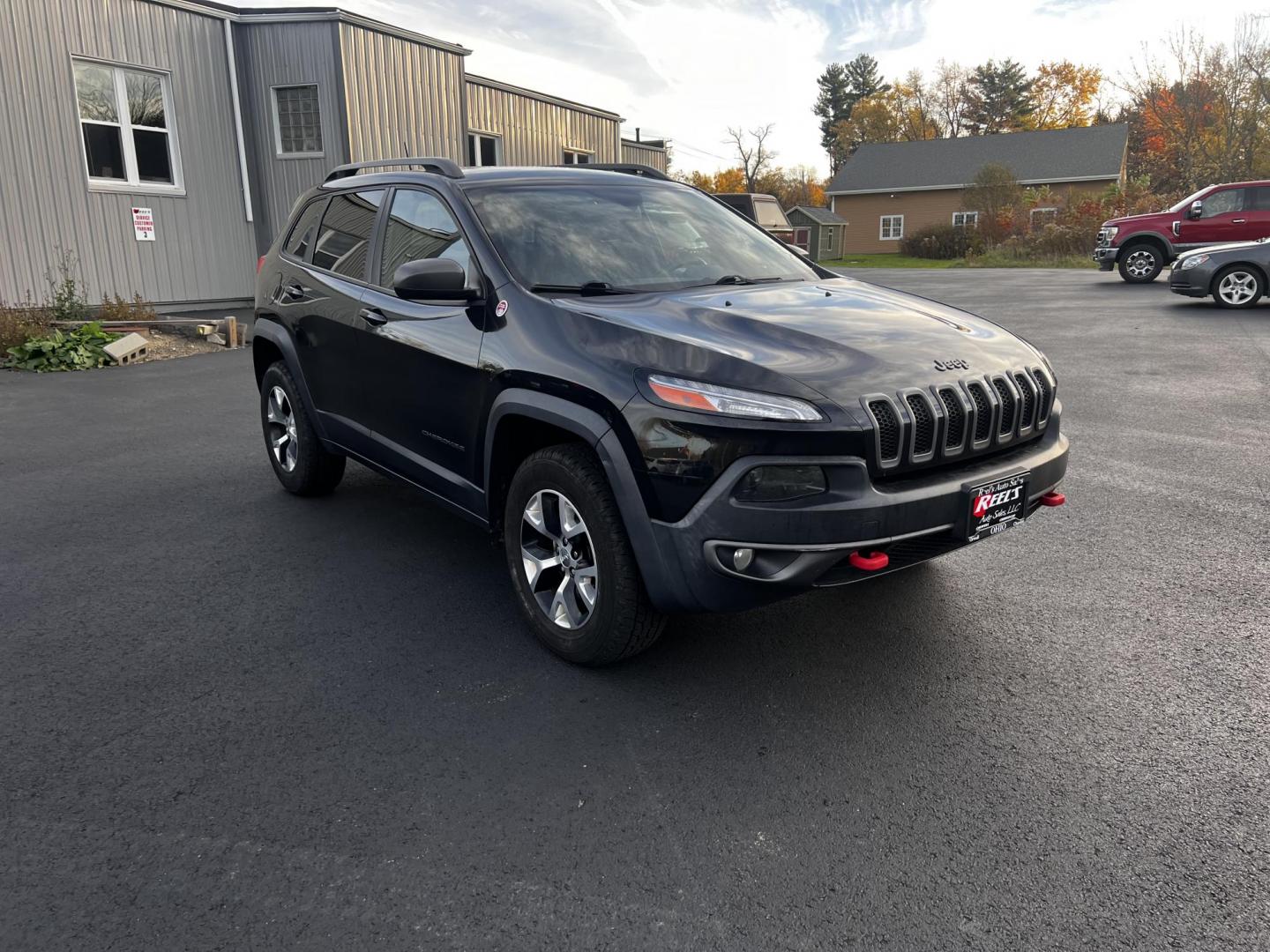 2015 Black /Black Jeep Cherokee Trailhawk 4WD (1C4PJMBS8FW) with an 3.2L V6 DOHC 24V engine, 9-Speed Automatic transmission, located at 11115 Chardon Rd. , Chardon, OH, 44024, (440) 214-9705, 41.580246, -81.241943 - Photo#3