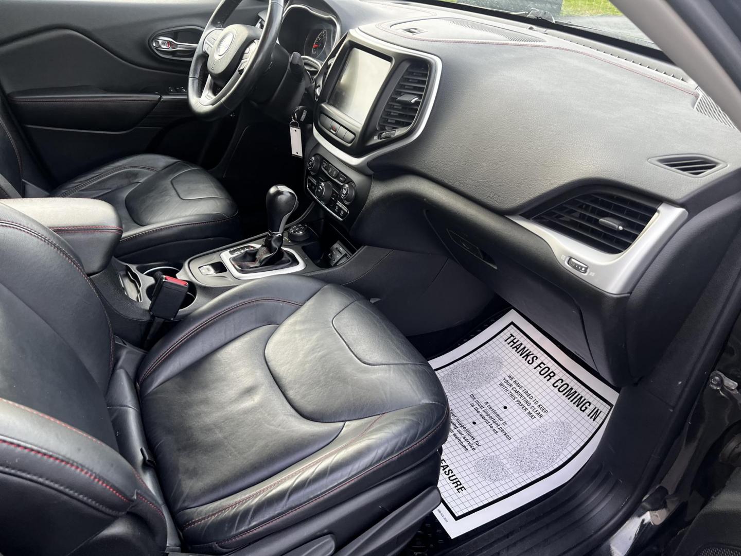 2015 Black /Black Jeep Cherokee Trailhawk 4WD (1C4PJMBS8FW) with an 3.2L V6 DOHC 24V engine, 9-Speed Automatic transmission, located at 11115 Chardon Rd. , Chardon, OH, 44024, (440) 214-9705, 41.580246, -81.241943 - Photo#38