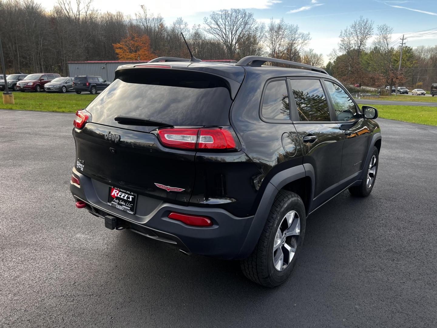 2015 Black /Black Jeep Cherokee Trailhawk 4WD (1C4PJMBS8FW) with an 3.2L V6 DOHC 24V engine, 9-Speed Automatic transmission, located at 11115 Chardon Rd. , Chardon, OH, 44024, (440) 214-9705, 41.580246, -81.241943 - Photo#8