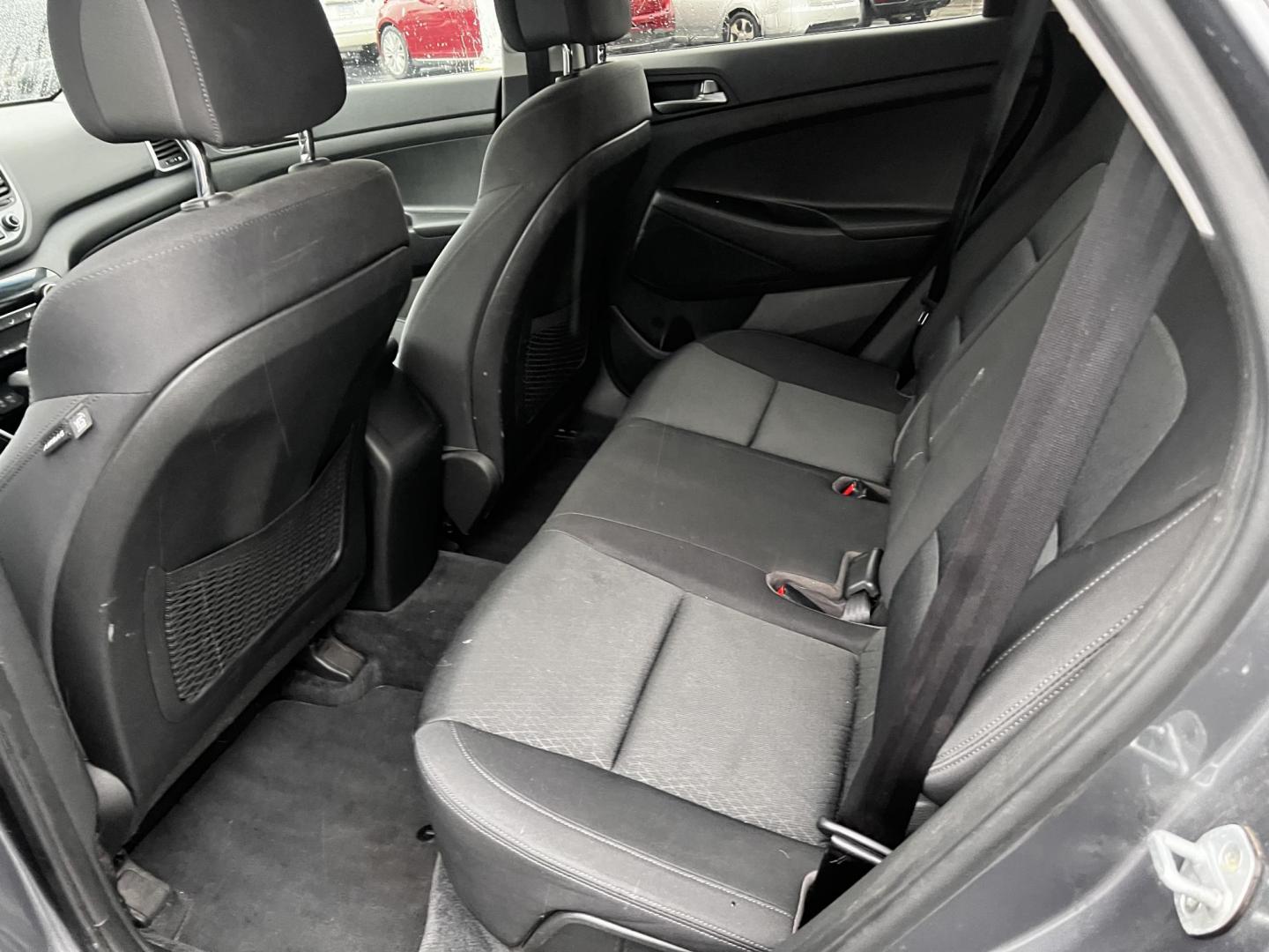 2017 Gray /Black Hyundai Tucson SE w/Popular Package AWD (KM8J3CA43HU) with an 2.0L I4 DOHC 16V engine, 6 Speed Auto transmission, located at 11115 Chardon Rd. , Chardon, OH, 44024, (440) 214-9705, 41.580246, -81.241943 - This 2017 Hyundai Tucson SE AWD is a well-rounded compact SUV that offers a balance of efficiency, technology, and functionality. Powered by a 2.0 I4 GDI engine and equipped with a 6-speed automatic transmission, it provides a commendable fuel efficiency of 26 MPG on the highway. This vehicle includ - Photo#30