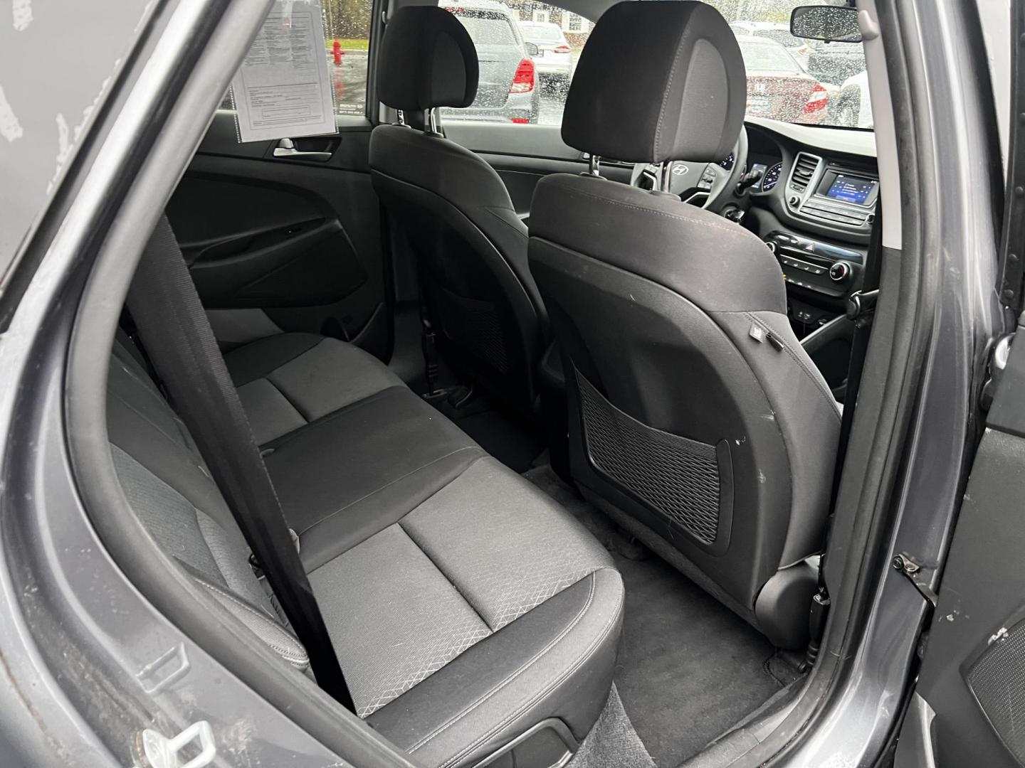 2017 Gray /Black Hyundai Tucson SE w/Popular Package AWD (KM8J3CA43HU) with an 2.0L I4 DOHC 16V engine, 6 Speed Auto transmission, located at 11115 Chardon Rd. , Chardon, OH, 44024, (440) 214-9705, 41.580246, -81.241943 - This 2017 Hyundai Tucson SE AWD is a well-rounded compact SUV that offers a balance of efficiency, technology, and functionality. Powered by a 2.0 I4 GDI engine and equipped with a 6-speed automatic transmission, it provides a commendable fuel efficiency of 26 MPG on the highway. This vehicle includ - Photo#32
