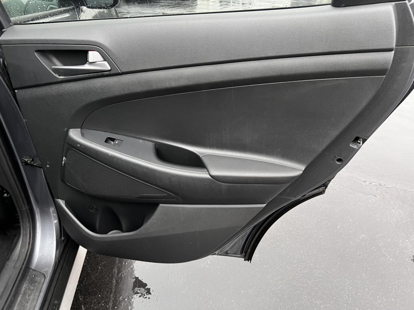 2017 Gray /Black Hyundai Tucson SE w/Popular Package AWD (KM8J3CA43HU) with an 2.0L I4 DOHC 16V engine, 6 Speed Auto transmission, located at 11115 Chardon Rd. , Chardon, OH, 44024, (440) 214-9705, 41.580246, -81.241943 - This 2017 Hyundai Tucson SE AWD is a well-rounded compact SUV that offers a balance of efficiency, technology, and functionality. Powered by a 2.0 I4 GDI engine and equipped with a 6-speed automatic transmission, it provides a commendable fuel efficiency of 26 MPG on the highway. This vehicle includ - Photo#33