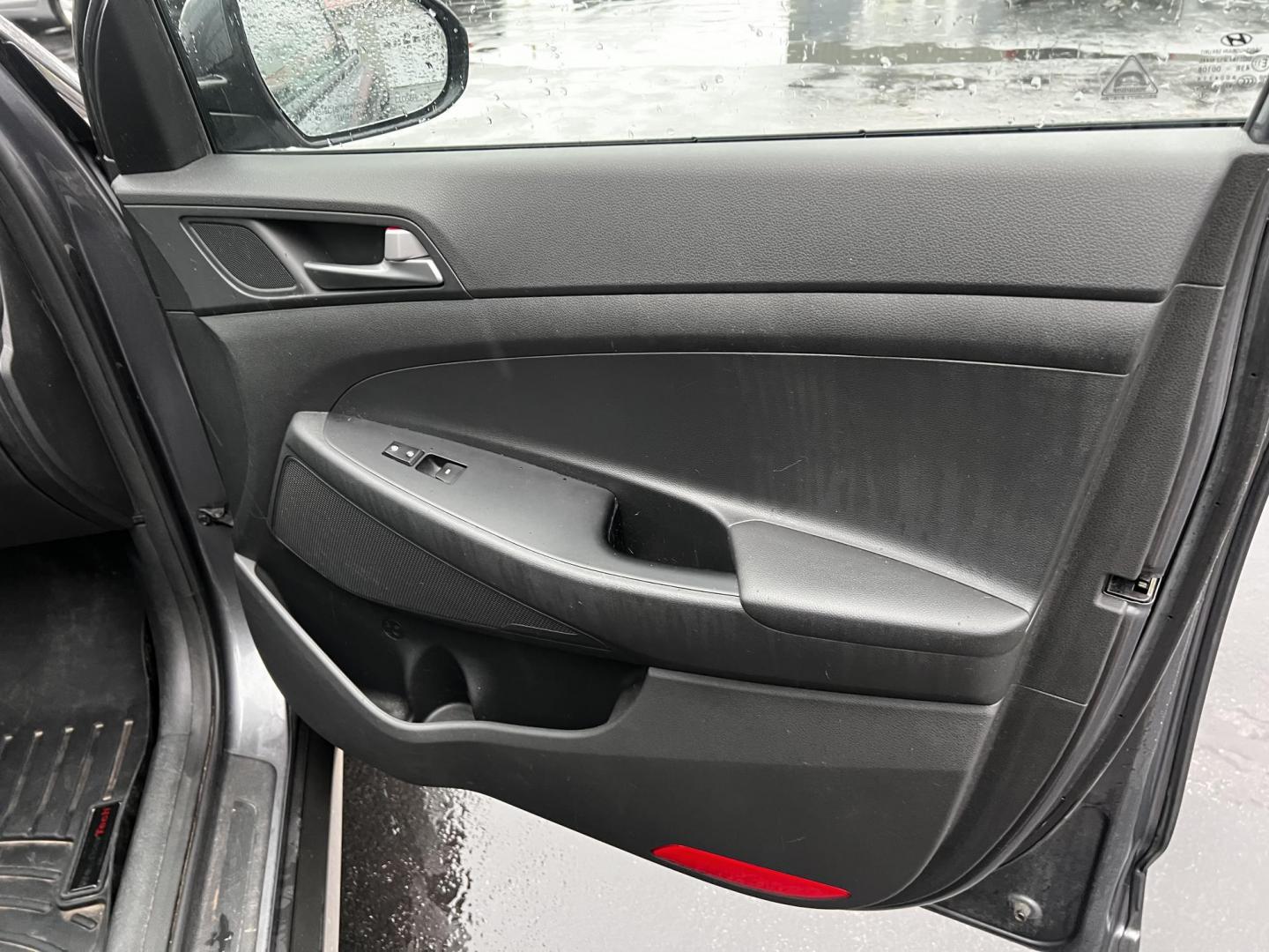 2017 Gray /Black Hyundai Tucson SE w/Popular Package AWD (KM8J3CA43HU) with an 2.0L I4 DOHC 16V engine, 6 Speed Auto transmission, located at 11115 Chardon Rd. , Chardon, OH, 44024, (440) 214-9705, 41.580246, -81.241943 - This 2017 Hyundai Tucson SE AWD is a well-rounded compact SUV that offers a balance of efficiency, technology, and functionality. Powered by a 2.0 I4 GDI engine and equipped with a 6-speed automatic transmission, it provides a commendable fuel efficiency of 26 MPG on the highway. This vehicle includ - Photo#34