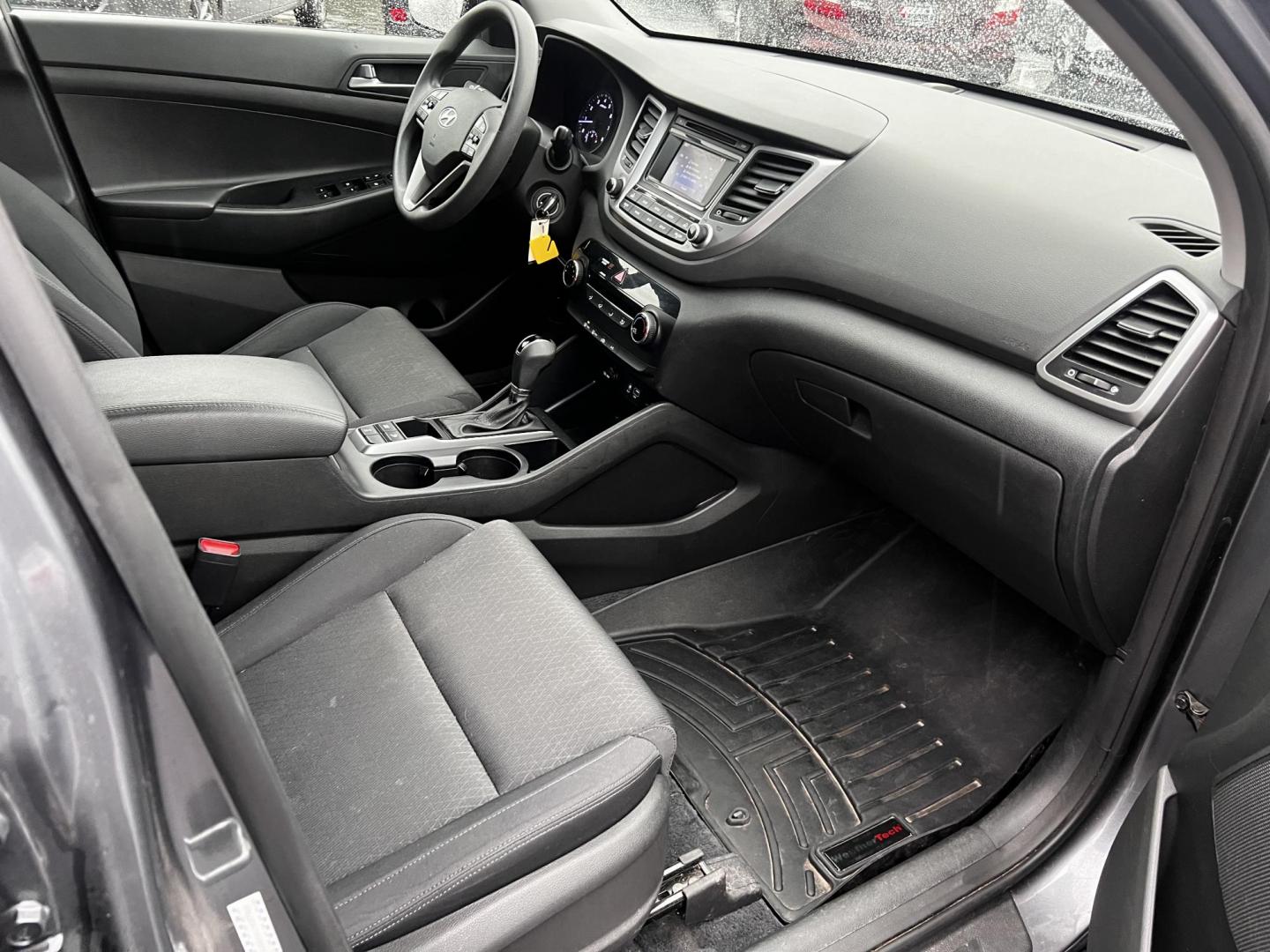 2017 Gray /Black Hyundai Tucson SE w/Popular Package AWD (KM8J3CA43HU) with an 2.0L I4 DOHC 16V engine, 6 Speed Auto transmission, located at 11115 Chardon Rd. , Chardon, OH, 44024, (440) 214-9705, 41.580246, -81.241943 - This 2017 Hyundai Tucson SE AWD is a well-rounded compact SUV that offers a balance of efficiency, technology, and functionality. Powered by a 2.0 I4 GDI engine and equipped with a 6-speed automatic transmission, it provides a commendable fuel efficiency of 26 MPG on the highway. This vehicle includ - Photo#35