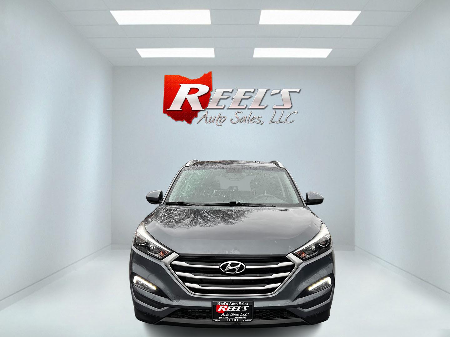2017 Gray /Black Hyundai Tucson SE w/Popular Package AWD (KM8J3CA43HU) with an 2.0L I4 DOHC 16V engine, 6 Speed Auto transmission, located at 11115 Chardon Rd. , Chardon, OH, 44024, (440) 214-9705, 41.580246, -81.241943 - This 2017 Hyundai Tucson SE AWD is a well-rounded compact SUV that offers a balance of efficiency, technology, and functionality. Powered by a 2.0 I4 GDI engine and equipped with a 6-speed automatic transmission, it provides a commendable fuel efficiency of 26 MPG on the highway. This vehicle includ - Photo#1