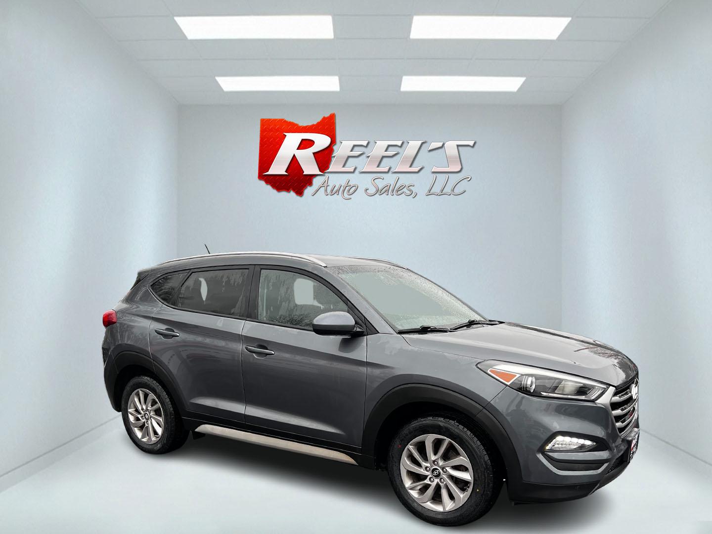 2017 Gray /Black Hyundai Tucson SE w/Popular Package AWD (KM8J3CA43HU) with an 2.0L I4 DOHC 16V engine, 6 Speed Auto transmission, located at 11115 Chardon Rd. , Chardon, OH, 44024, (440) 214-9705, 41.580246, -81.241943 - This 2017 Hyundai Tucson SE AWD is a well-rounded compact SUV that offers a balance of efficiency, technology, and functionality. Powered by a 2.0 I4 GDI engine and equipped with a 6-speed automatic transmission, it provides a commendable fuel efficiency of 26 MPG on the highway. This vehicle includ - Photo#13