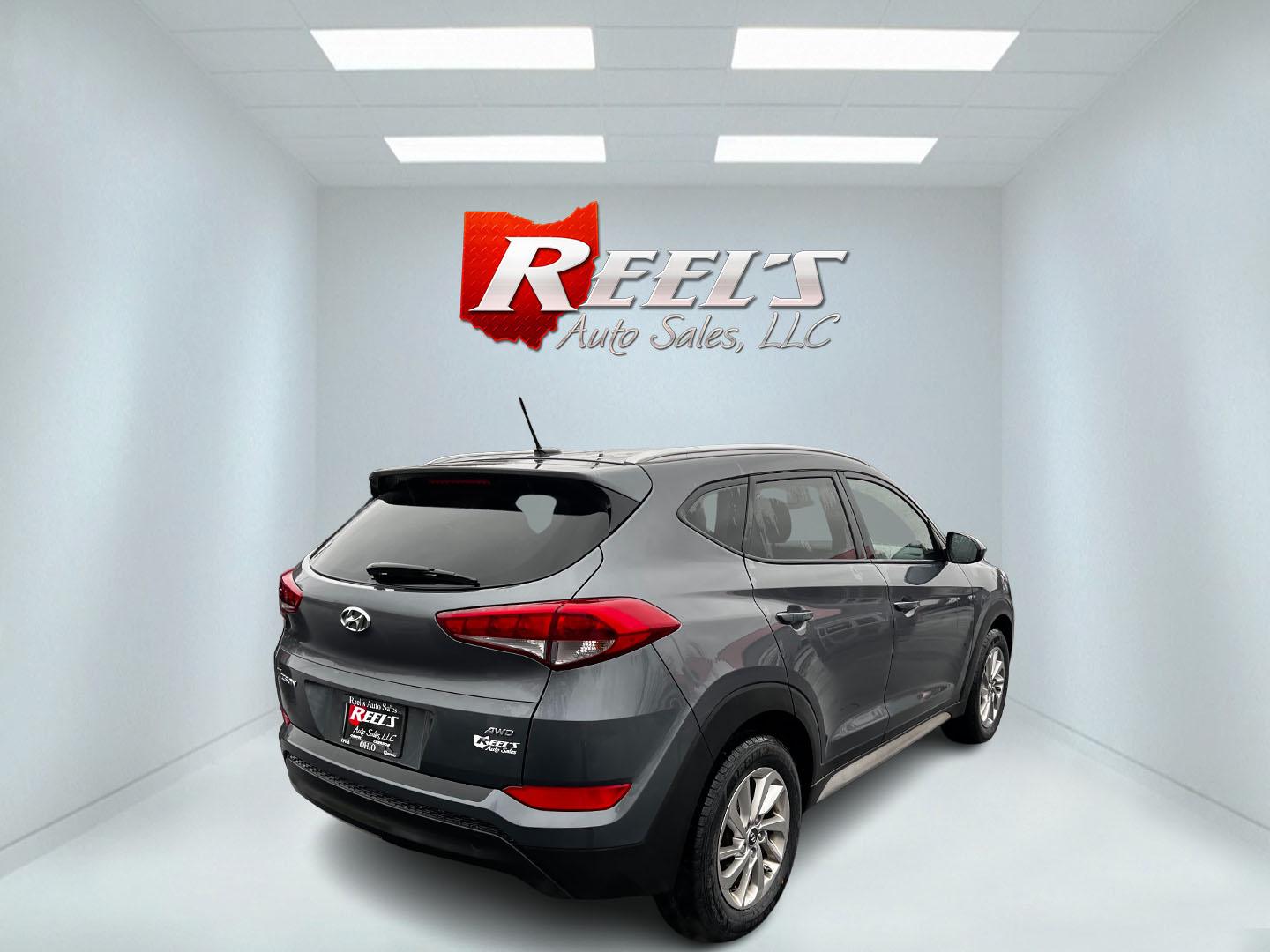 2017 Gray /Black Hyundai Tucson SE w/Popular Package AWD (KM8J3CA43HU) with an 2.0L I4 DOHC 16V engine, 6 Speed Auto transmission, located at 11115 Chardon Rd. , Chardon, OH, 44024, (440) 214-9705, 41.580246, -81.241943 - This 2017 Hyundai Tucson SE AWD is a well-rounded compact SUV that offers a balance of efficiency, technology, and functionality. Powered by a 2.0 I4 GDI engine and equipped with a 6-speed automatic transmission, it provides a commendable fuel efficiency of 26 MPG on the highway. This vehicle includ - Photo#15