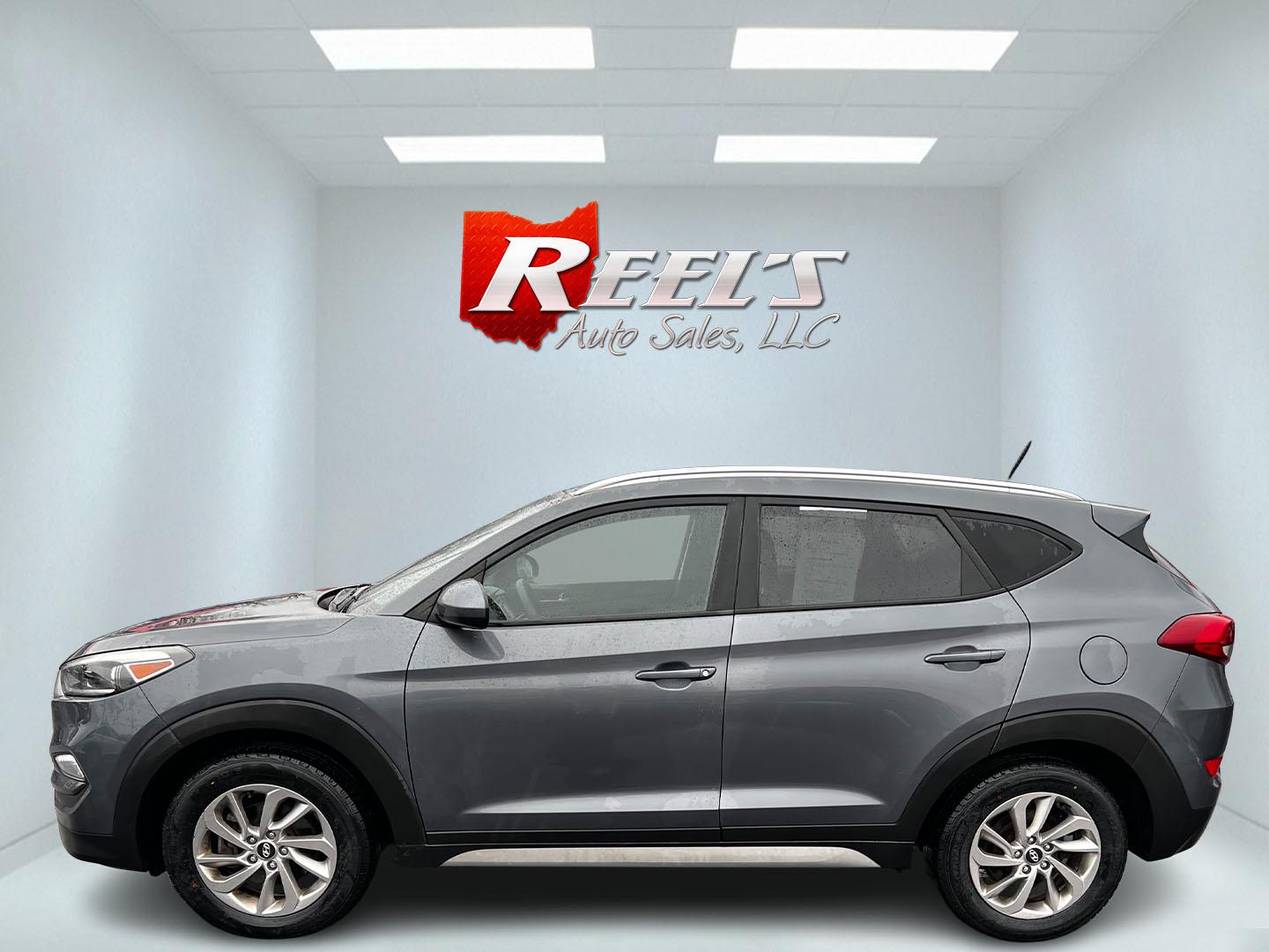 2017 Gray /Black Hyundai Tucson SE w/Popular Package AWD (KM8J3CA43HU) with an 2.0L I4 DOHC 16V engine, 6 Speed Auto transmission, located at 11115 Chardon Rd. , Chardon, OH, 44024, (440) 214-9705, 41.580246, -81.241943 - This 2017 Hyundai Tucson SE AWD is a well-rounded compact SUV that offers a balance of efficiency, technology, and functionality. Powered by a 2.0 I4 GDI engine and equipped with a 6-speed automatic transmission, it provides a commendable fuel efficiency of 26 MPG on the highway. This vehicle includ - Photo#19