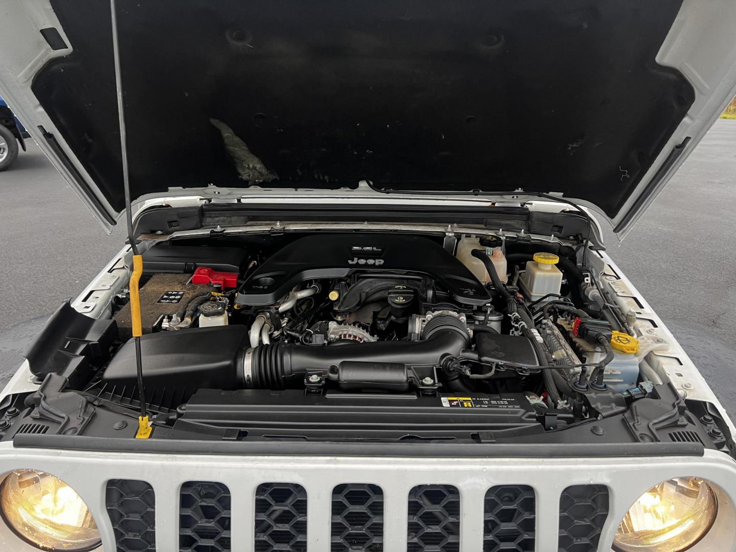 2020 White /Black Jeep Gladiator Sport S (1C6HJTAGXLL) with an 3.6L V6 DOHC 24V engine, 8-Speed Automatic transmission, located at 11115 Chardon Rd. , Chardon, OH, 44024, (440) 214-9705, 41.580246, -81.241943 - This 2020 Jeep Gladiator Sport S is a versatile midsize pickup renowned for its robust capabilities and modern features. Powered by a 3.6L Pentastar V6 engine paired with an 8-speed automatic transmission, it delivers a solid highway mileage of 22 MPG. Noteworthy features include a 7.0" touchscreen - Photo#14