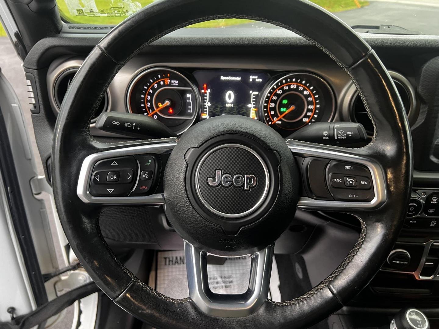 2020 White /Black Jeep Gladiator Sport S (1C6HJTAGXLL) with an 3.6L V6 DOHC 24V engine, 8-Speed Automatic transmission, located at 11115 Chardon Rd. , Chardon, OH, 44024, (440) 214-9705, 41.580246, -81.241943 - This 2020 Jeep Gladiator Sport S is a versatile midsize pickup renowned for its robust capabilities and modern features. Powered by a 3.6L Pentastar V6 engine paired with an 8-speed automatic transmission, it delivers a solid highway mileage of 22 MPG. Noteworthy features include a 7.0" touchscreen - Photo#19