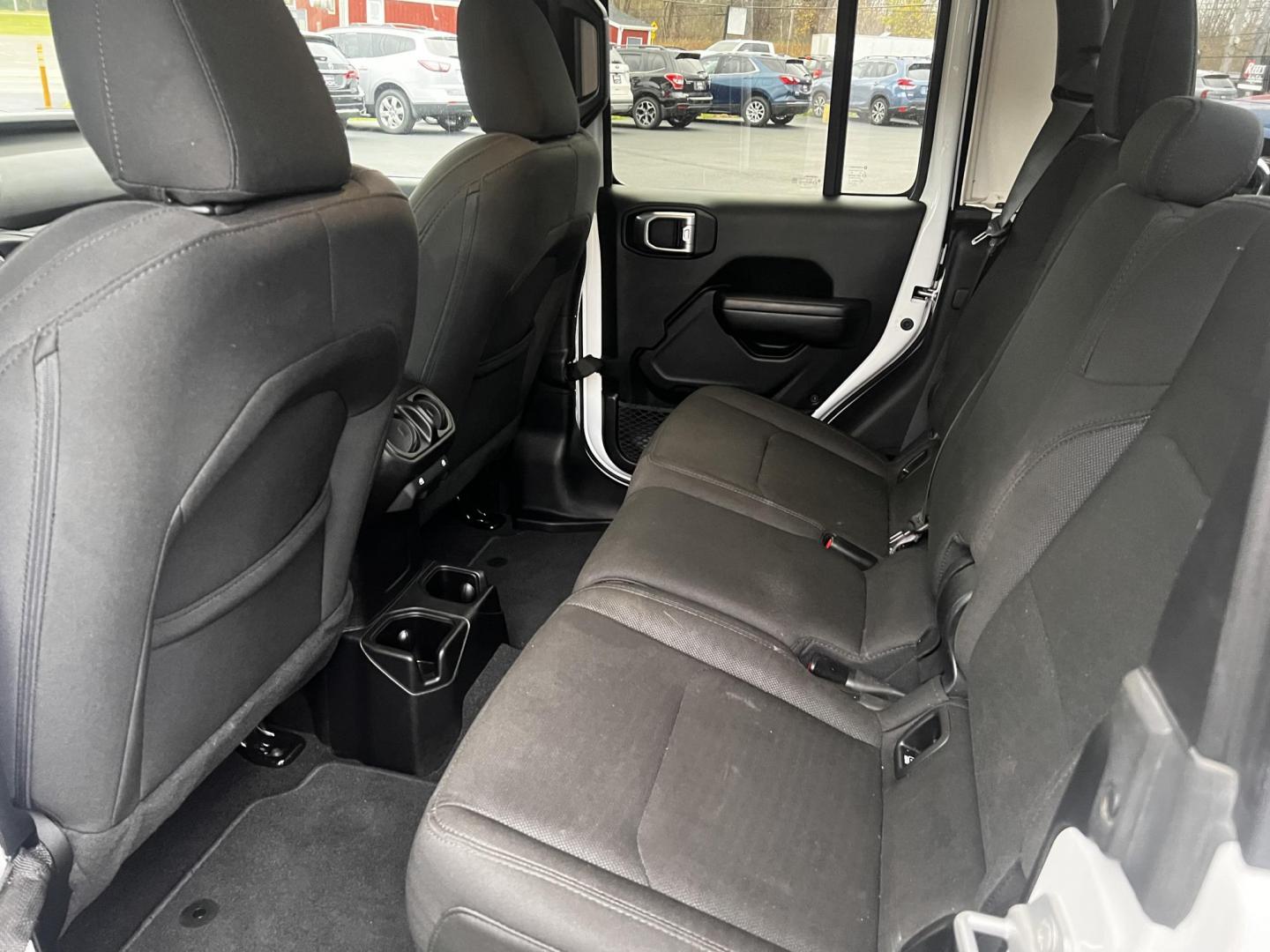 2020 White /Black Jeep Gladiator Sport S (1C6HJTAGXLL) with an 3.6L V6 DOHC 24V engine, 8-Speed Automatic transmission, located at 11115 Chardon Rd. , Chardon, OH, 44024, (440) 214-9705, 41.580246, -81.241943 - This 2020 Jeep Gladiator Sport S is a versatile midsize pickup renowned for its robust capabilities and modern features. Powered by a 3.6L Pentastar V6 engine paired with an 8-speed automatic transmission, it delivers a solid highway mileage of 22 MPG. Noteworthy features include a 7.0" touchscreen - Photo#27
