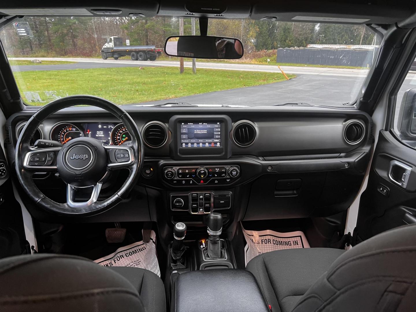 2020 White /Black Jeep Gladiator Sport S (1C6HJTAGXLL) with an 3.6L V6 DOHC 24V engine, 8-Speed Automatic transmission, located at 11115 Chardon Rd. , Chardon, OH, 44024, (440) 214-9705, 41.580246, -81.241943 - This 2020 Jeep Gladiator Sport S is a versatile midsize pickup renowned for its robust capabilities and modern features. Powered by a 3.6L Pentastar V6 engine paired with an 8-speed automatic transmission, it delivers a solid highway mileage of 22 MPG. Noteworthy features include a 7.0" touchscreen - Photo#31
