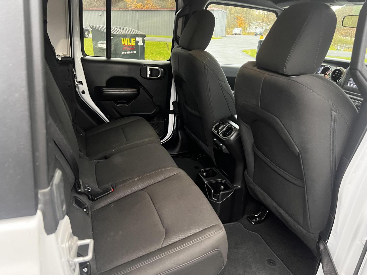 2020 White /Black Jeep Gladiator Sport S (1C6HJTAGXLL) with an 3.6L V6 DOHC 24V engine, 8-Speed Automatic transmission, located at 11115 Chardon Rd. , Chardon, OH, 44024, (440) 214-9705, 41.580246, -81.241943 - This 2020 Jeep Gladiator Sport S is a versatile midsize pickup renowned for its robust capabilities and modern features. Powered by a 3.6L Pentastar V6 engine paired with an 8-speed automatic transmission, it delivers a solid highway mileage of 22 MPG. Noteworthy features include a 7.0" touchscreen - Photo#32