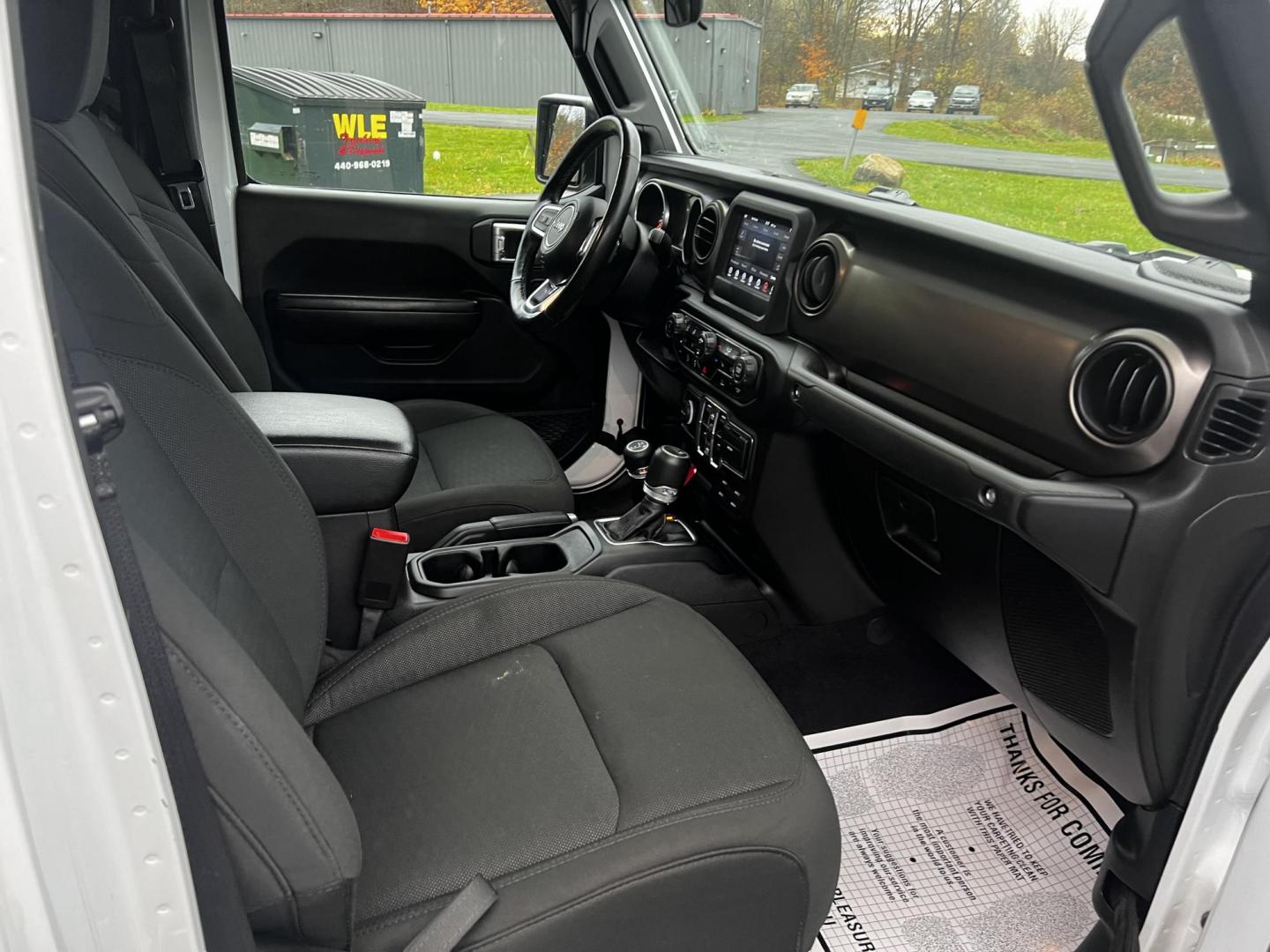 2020 White /Black Jeep Gladiator Sport S (1C6HJTAGXLL) with an 3.6L V6 DOHC 24V engine, 8-Speed Automatic transmission, located at 11115 Chardon Rd. , Chardon, OH, 44024, (440) 214-9705, 41.580246, -81.241943 - This 2020 Jeep Gladiator Sport S is a versatile midsize pickup renowned for its robust capabilities and modern features. Powered by a 3.6L Pentastar V6 engine paired with an 8-speed automatic transmission, it delivers a solid highway mileage of 22 MPG. Noteworthy features include a 7.0" touchscreen - Photo#34