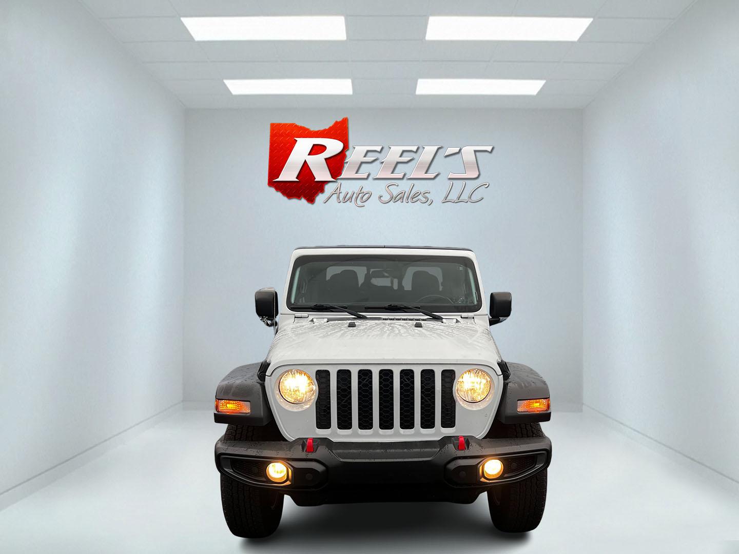 2020 White /Black Jeep Gladiator Sport S (1C6HJTAGXLL) with an 3.6L V6 DOHC 24V engine, 8-Speed Automatic transmission, located at 11115 Chardon Rd. , Chardon, OH, 44024, (440) 214-9705, 41.580246, -81.241943 - This 2020 Jeep Gladiator Sport S is a versatile midsize pickup renowned for its robust capabilities and modern features. Powered by a 3.6L Pentastar V6 engine paired with an 8-speed automatic transmission, it delivers a solid highway mileage of 22 MPG. Noteworthy features include a 7.0" touchscreen - Photo#1