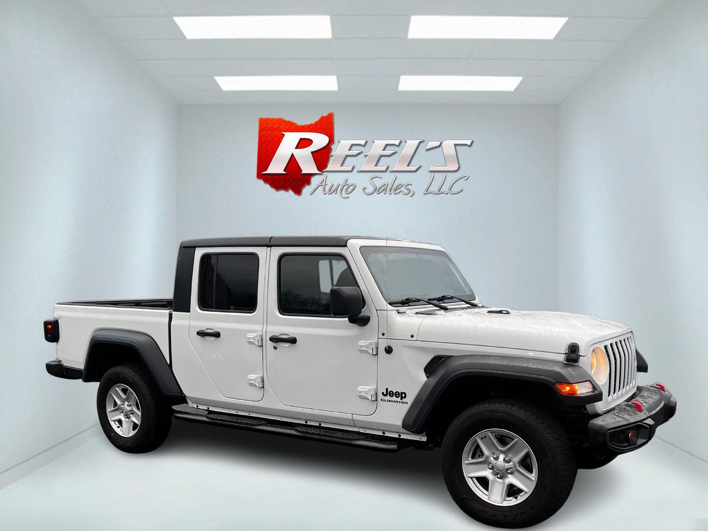 2020 White /Black Jeep Gladiator Sport S (1C6HJTAGXLL) with an 3.6L V6 DOHC 24V engine, 8-Speed Automatic transmission, located at 11115 Chardon Rd. , Chardon, OH, 44024, (440) 214-9705, 41.580246, -81.241943 - This 2020 Jeep Gladiator Sport S is a versatile midsize pickup renowned for its robust capabilities and modern features. Powered by a 3.6L Pentastar V6 engine paired with an 8-speed automatic transmission, it delivers a solid highway mileage of 22 MPG. Noteworthy features include a 7.0" touchscreen - Photo#3